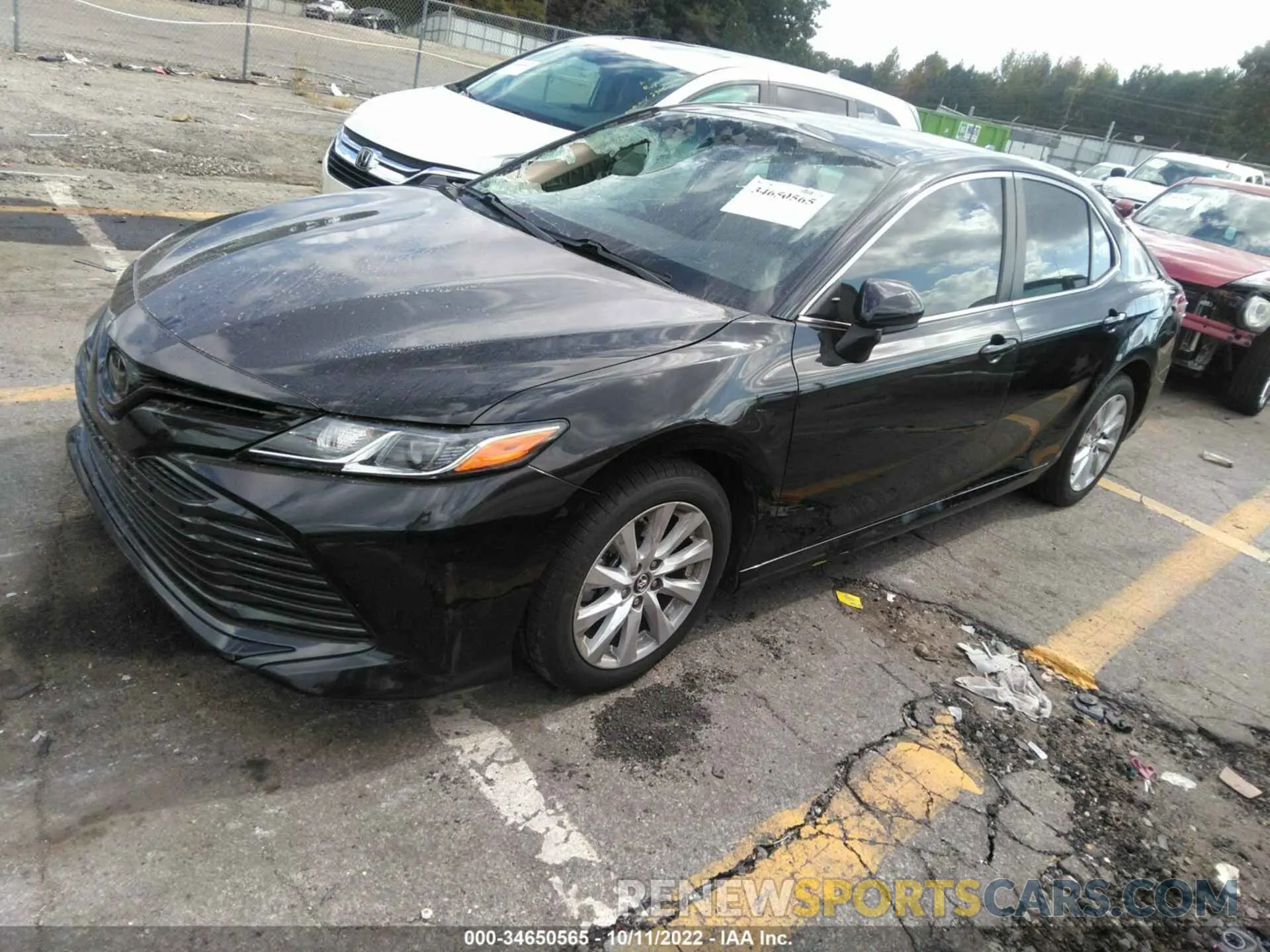 2 Photograph of a damaged car 4T1B11HK1KU701574 TOYOTA CAMRY 2019