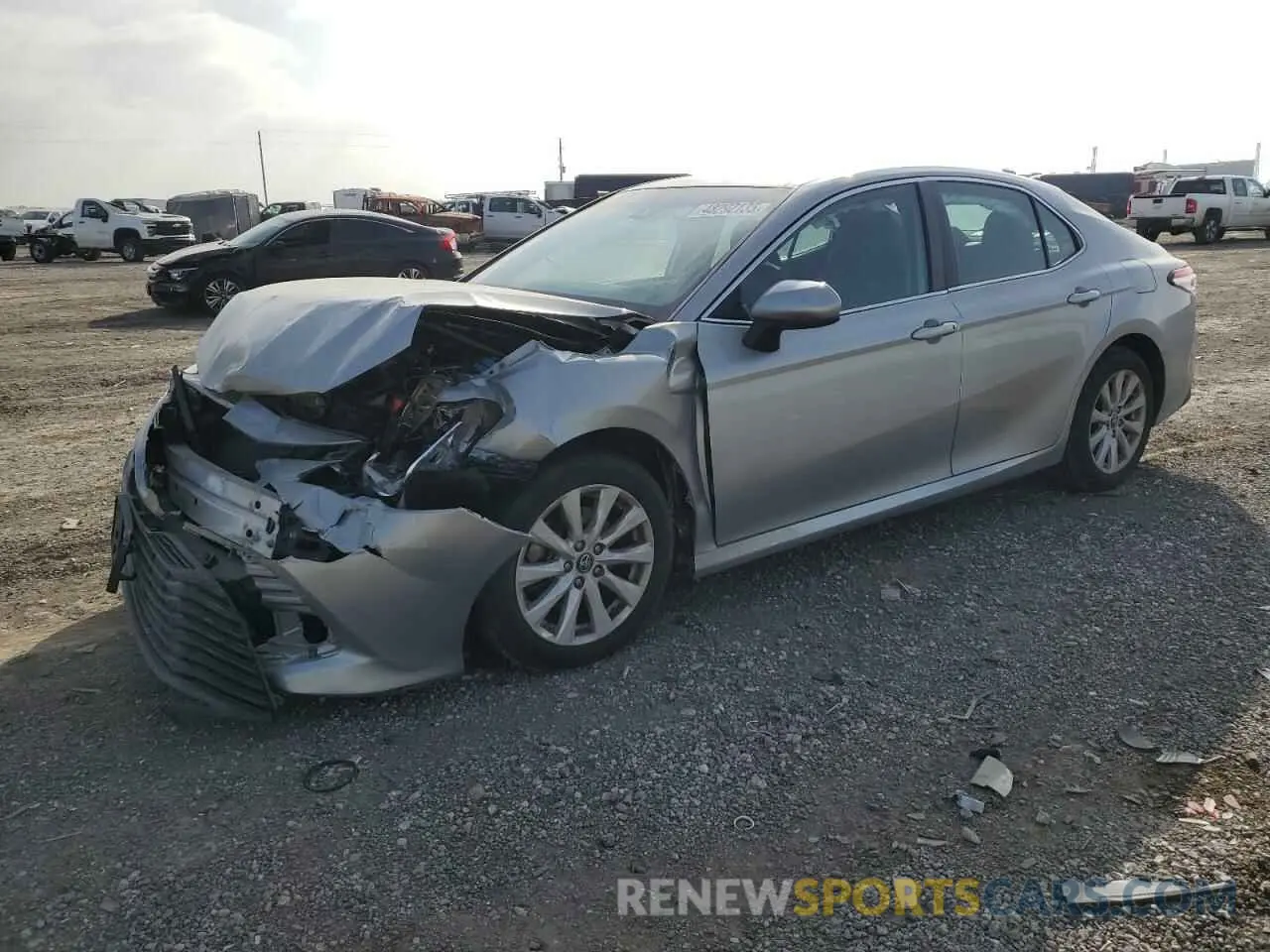 1 Photograph of a damaged car 4T1B11HK1KU704457 TOYOTA CAMRY 2019
