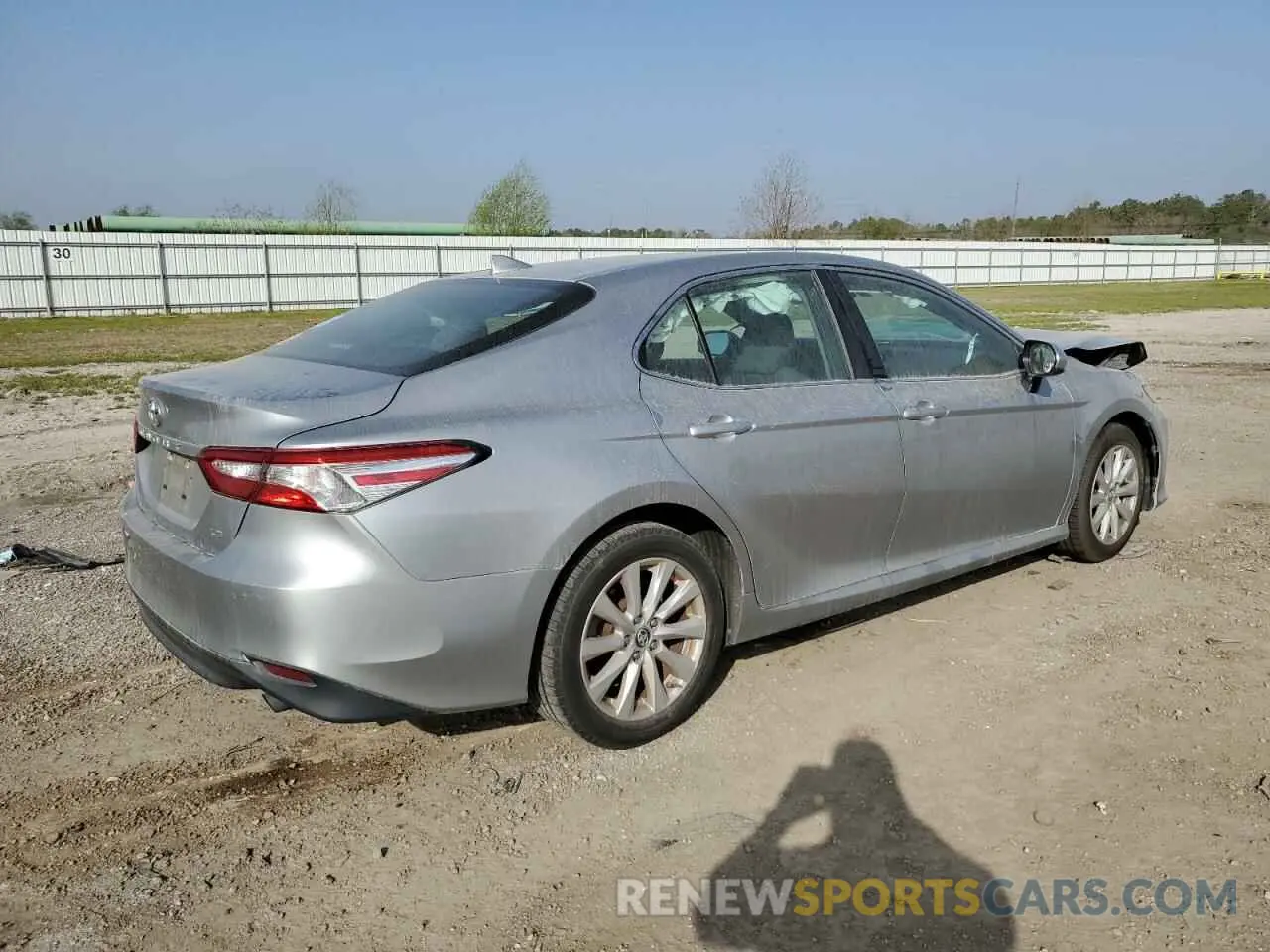 3 Photograph of a damaged car 4T1B11HK1KU704457 TOYOTA CAMRY 2019