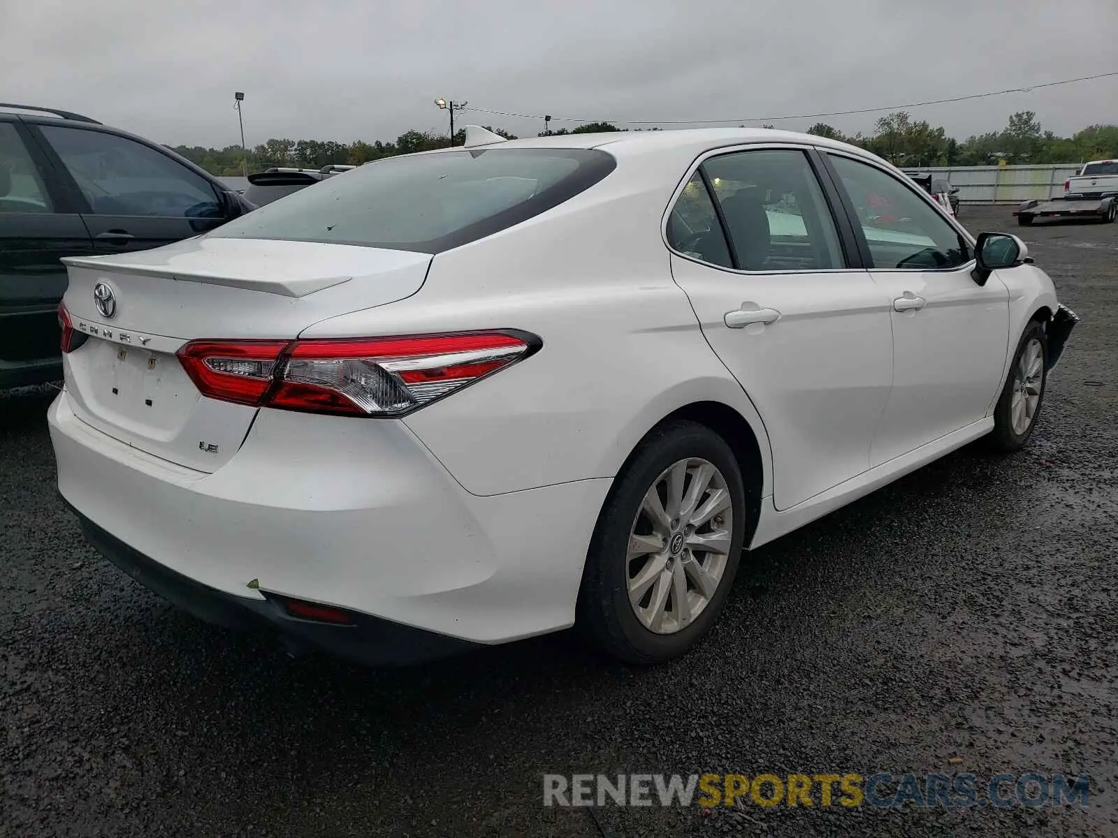 4 Photograph of a damaged car 4T1B11HK1KU707116 TOYOTA CAMRY 2019