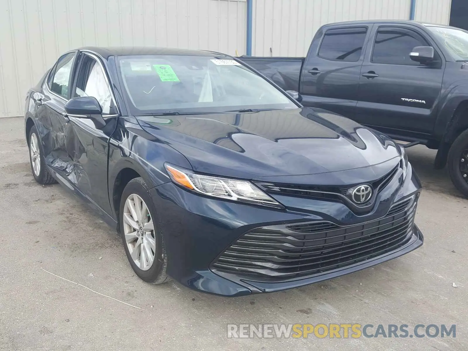 1 Photograph of a damaged car 4T1B11HK1KU710923 TOYOTA CAMRY 2019