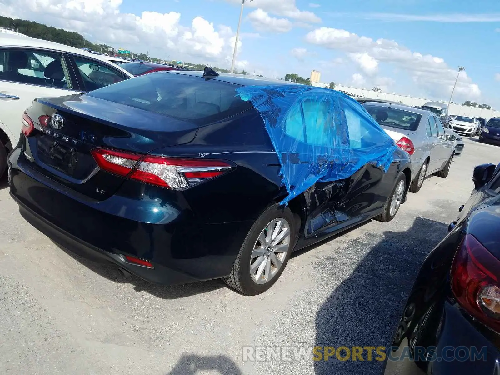 4 Photograph of a damaged car 4T1B11HK1KU710923 TOYOTA CAMRY 2019