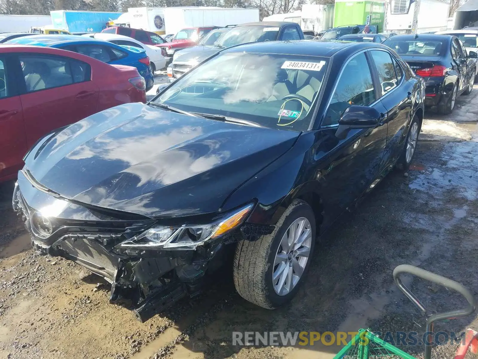 2 Photograph of a damaged car 4T1B11HK1KU712090 TOYOTA CAMRY 2019