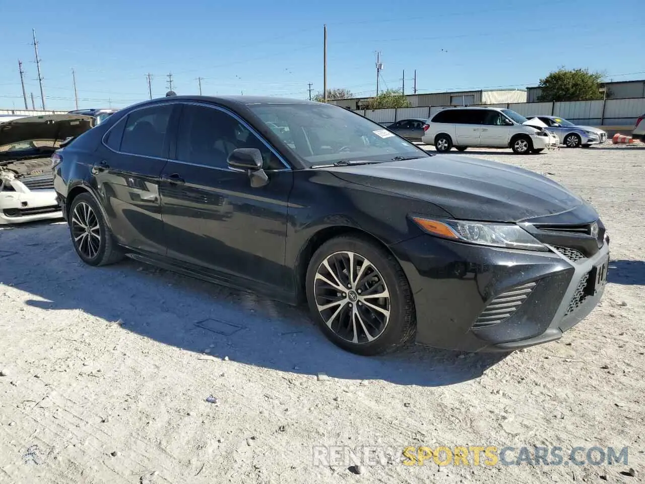 4 Photograph of a damaged car 4T1B11HK1KU723137 TOYOTA CAMRY 2019