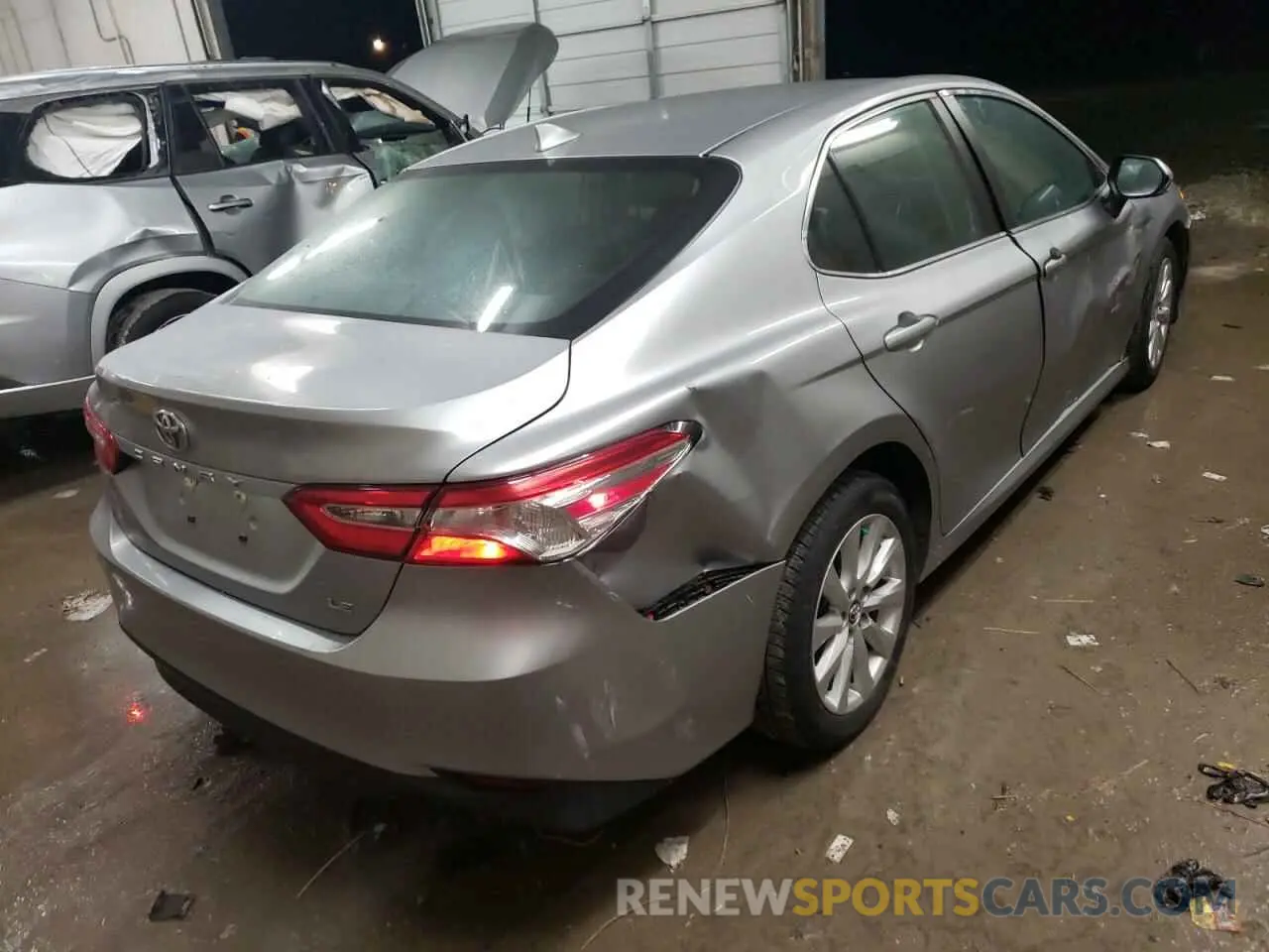3 Photograph of a damaged car 4T1B11HK1KU727771 TOYOTA CAMRY 2019