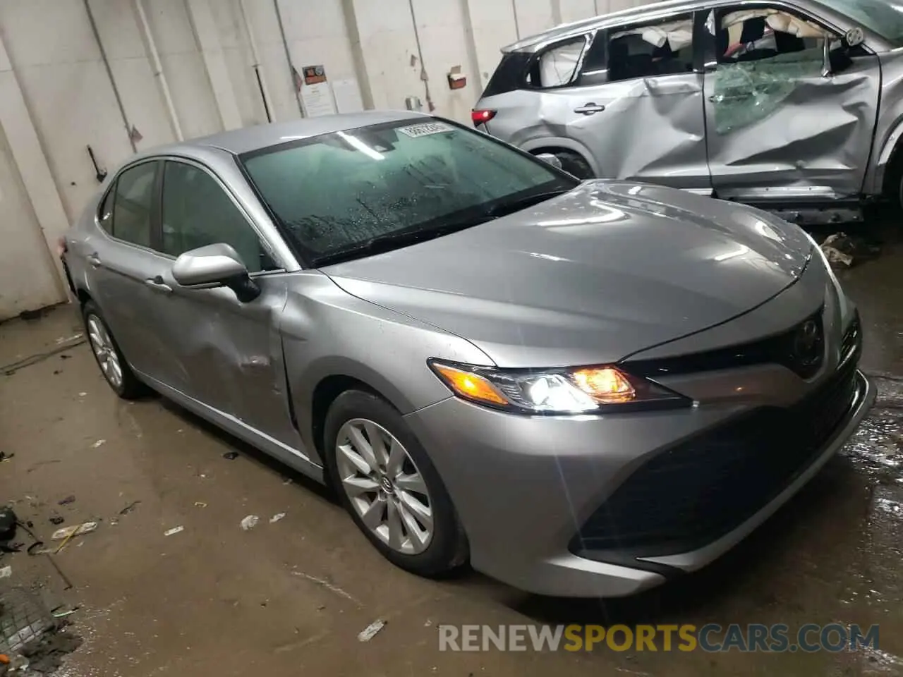 4 Photograph of a damaged car 4T1B11HK1KU727771 TOYOTA CAMRY 2019