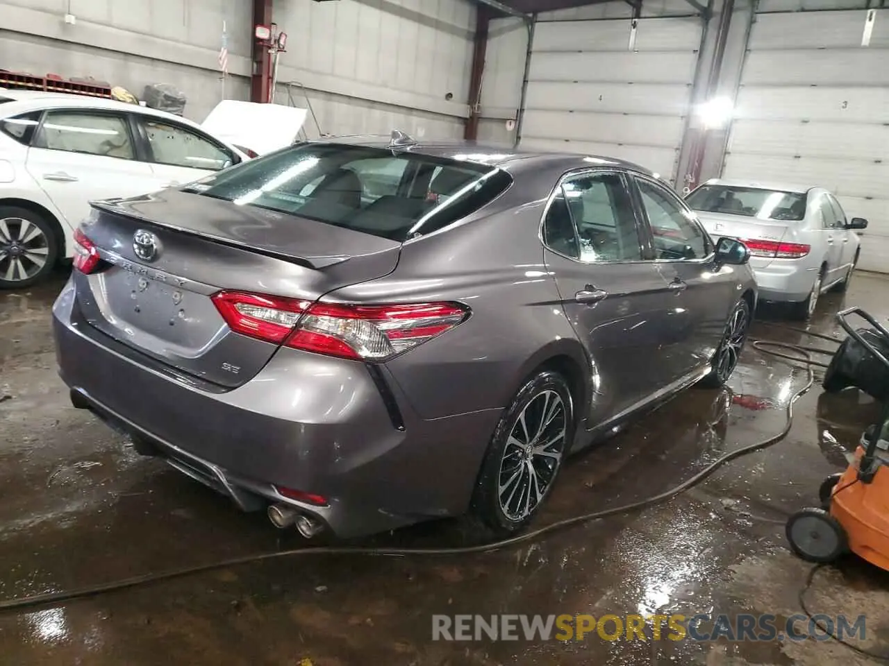 3 Photograph of a damaged car 4T1B11HK1KU733313 TOYOTA CAMRY 2019