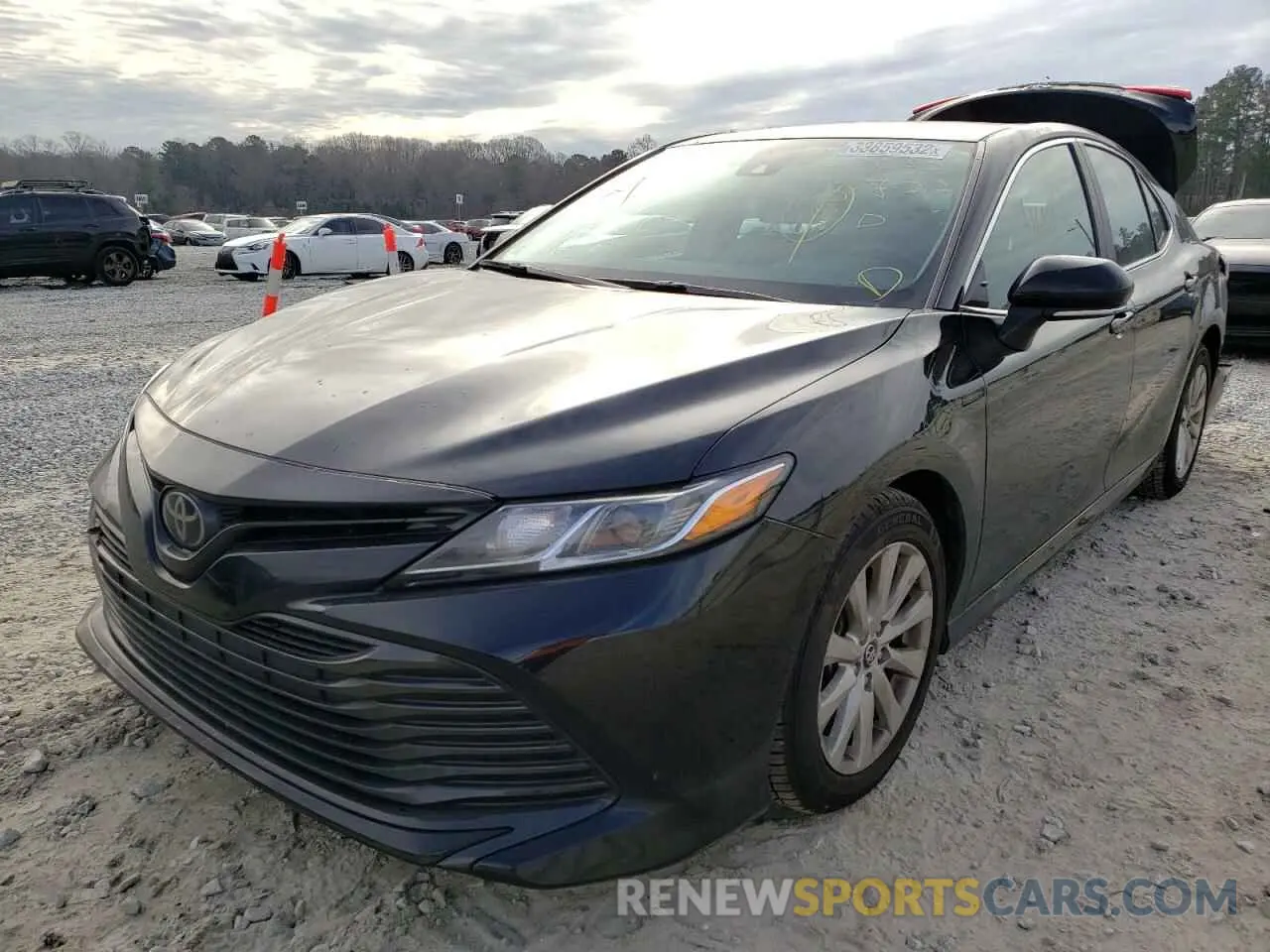 2 Photograph of a damaged car 4T1B11HK1KU733635 TOYOTA CAMRY 2019