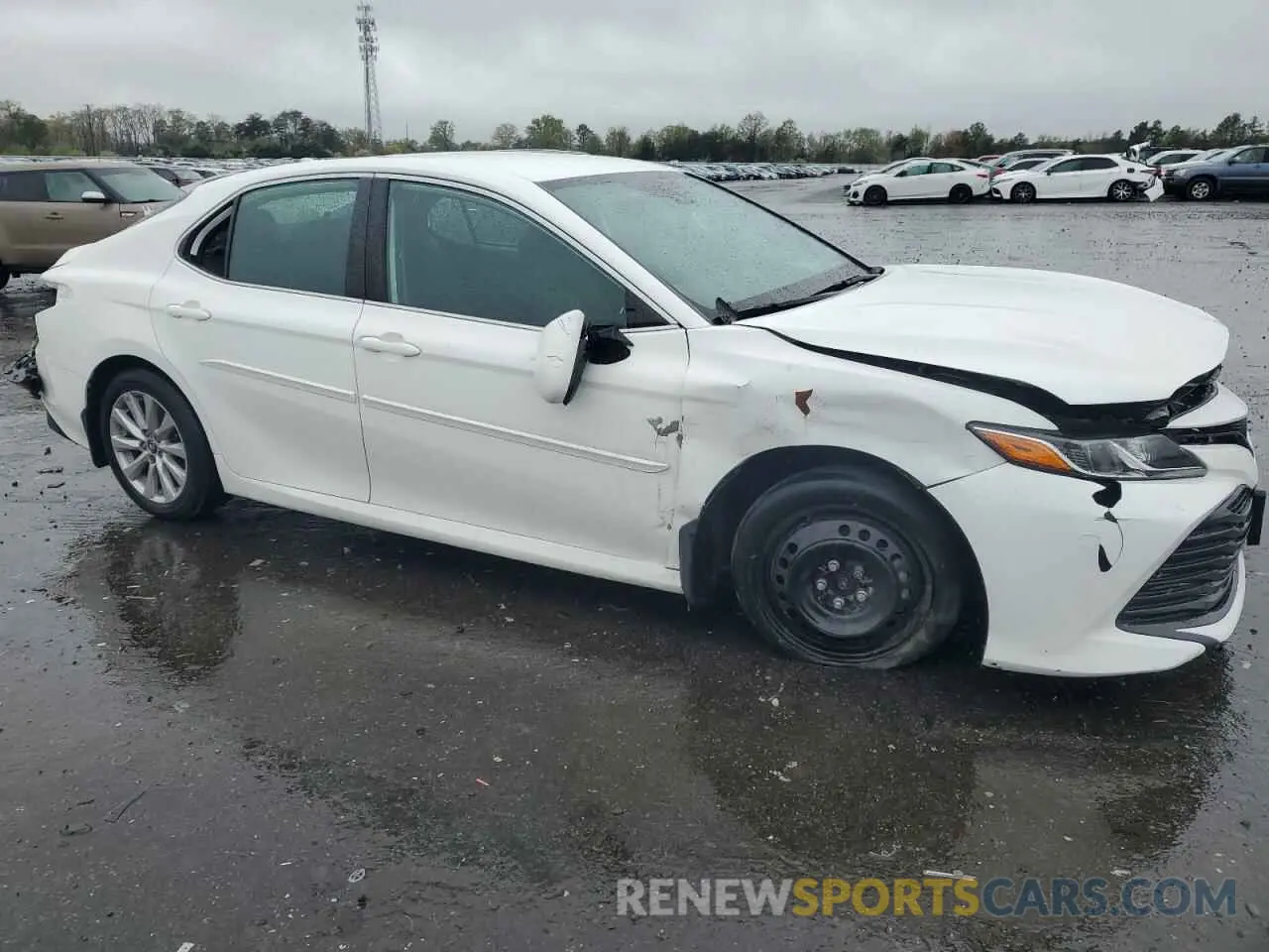 4 Photograph of a damaged car 4T1B11HK1KU747017 TOYOTA CAMRY 2019