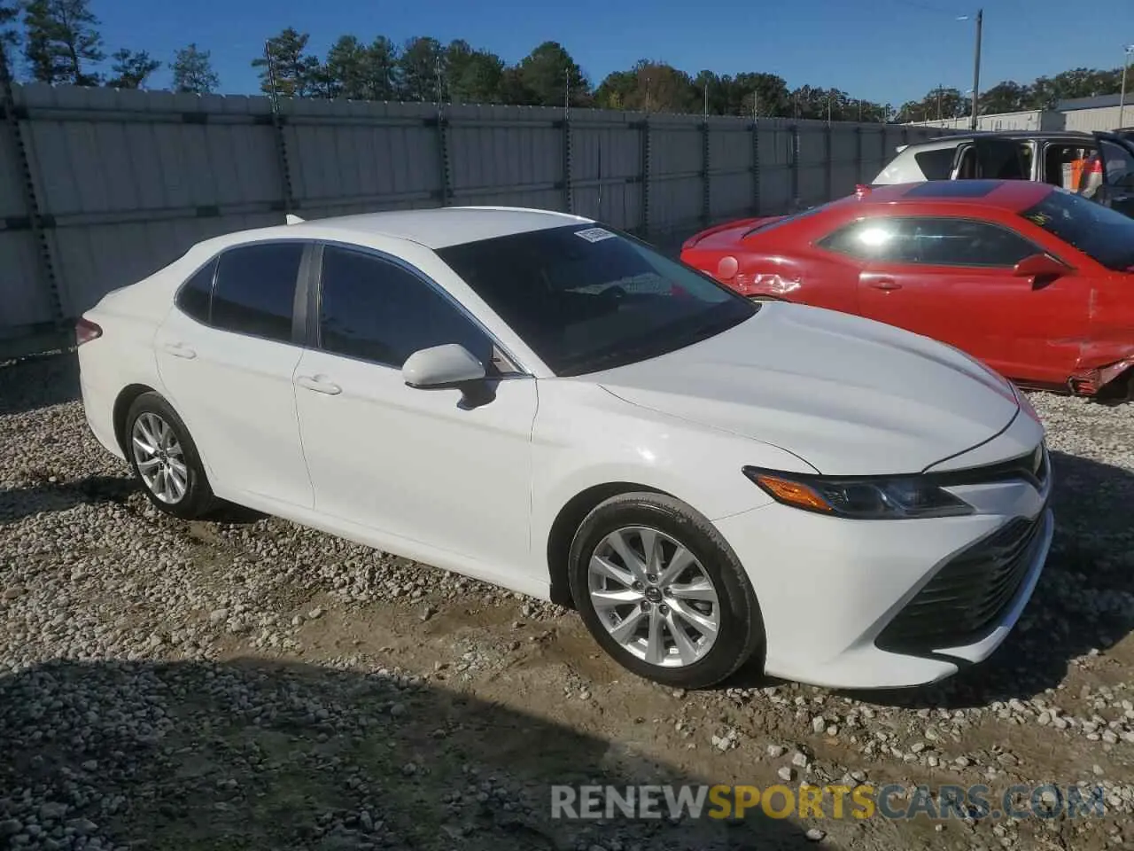 4 Photograph of a damaged car 4T1B11HK1KU756820 TOYOTA CAMRY 2019