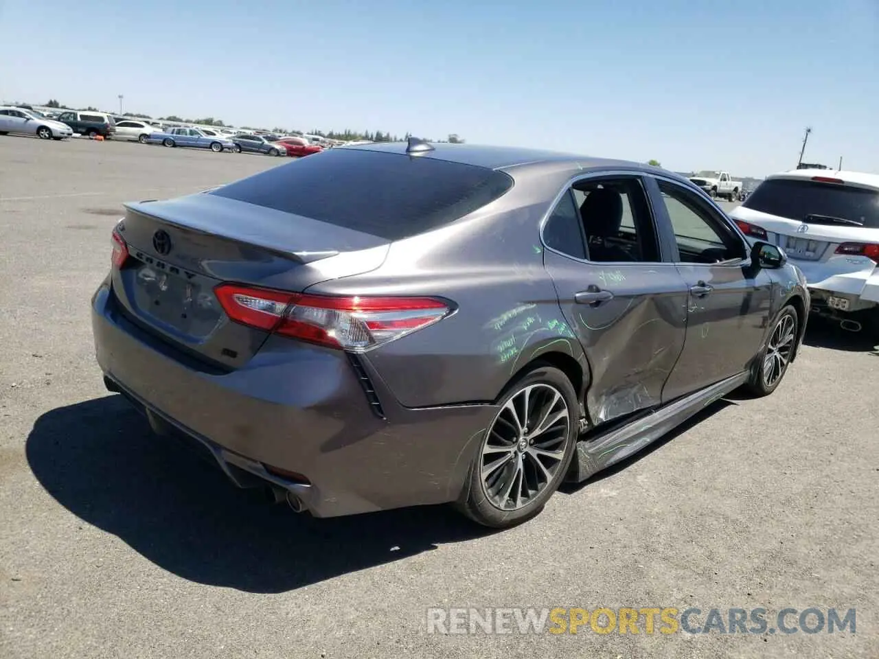 4 Photograph of a damaged car 4T1B11HK1KU766196 TOYOTA CAMRY 2019