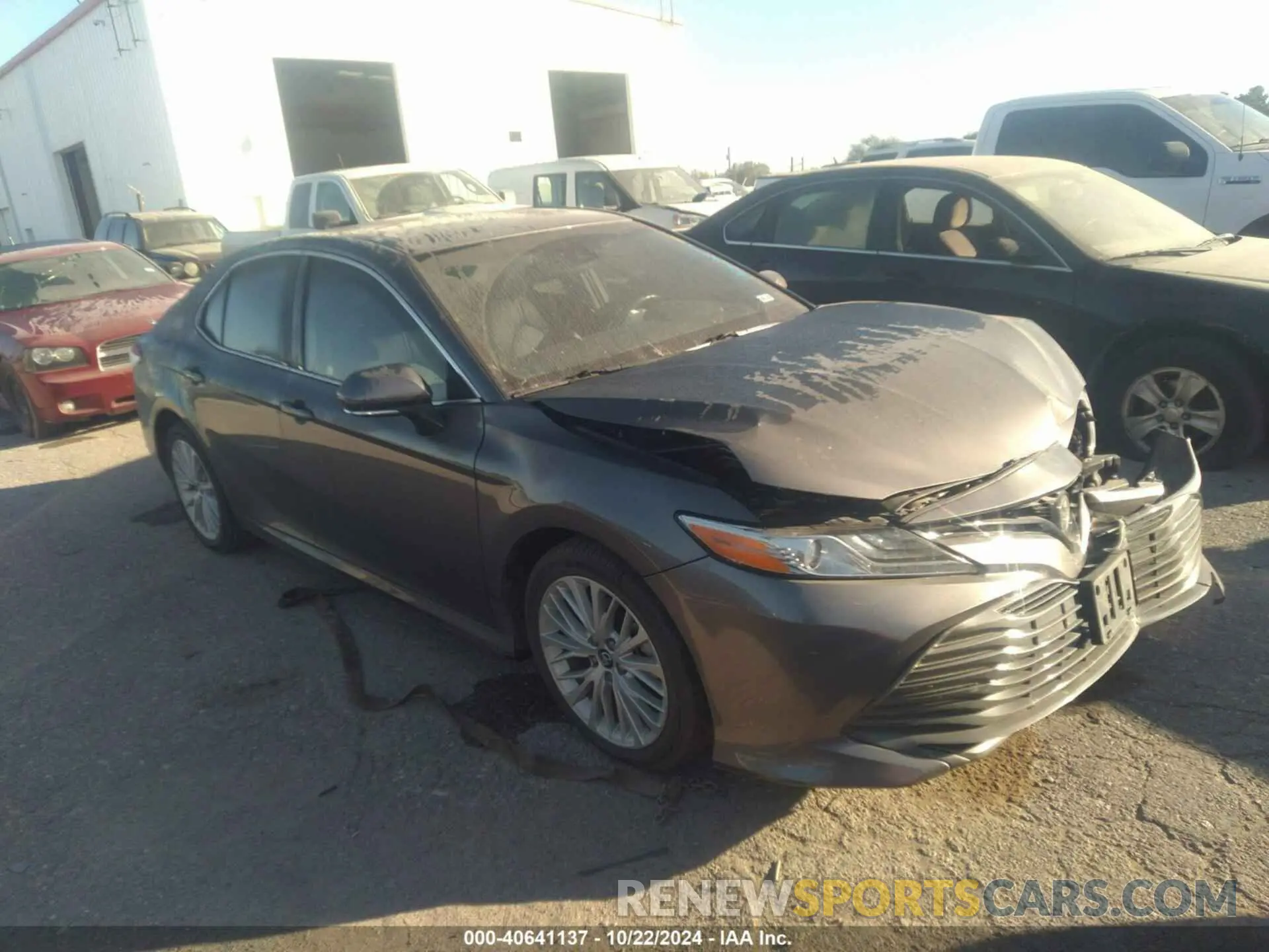 1 Photograph of a damaged car 4T1B11HK1KU809709 TOYOTA CAMRY 2019