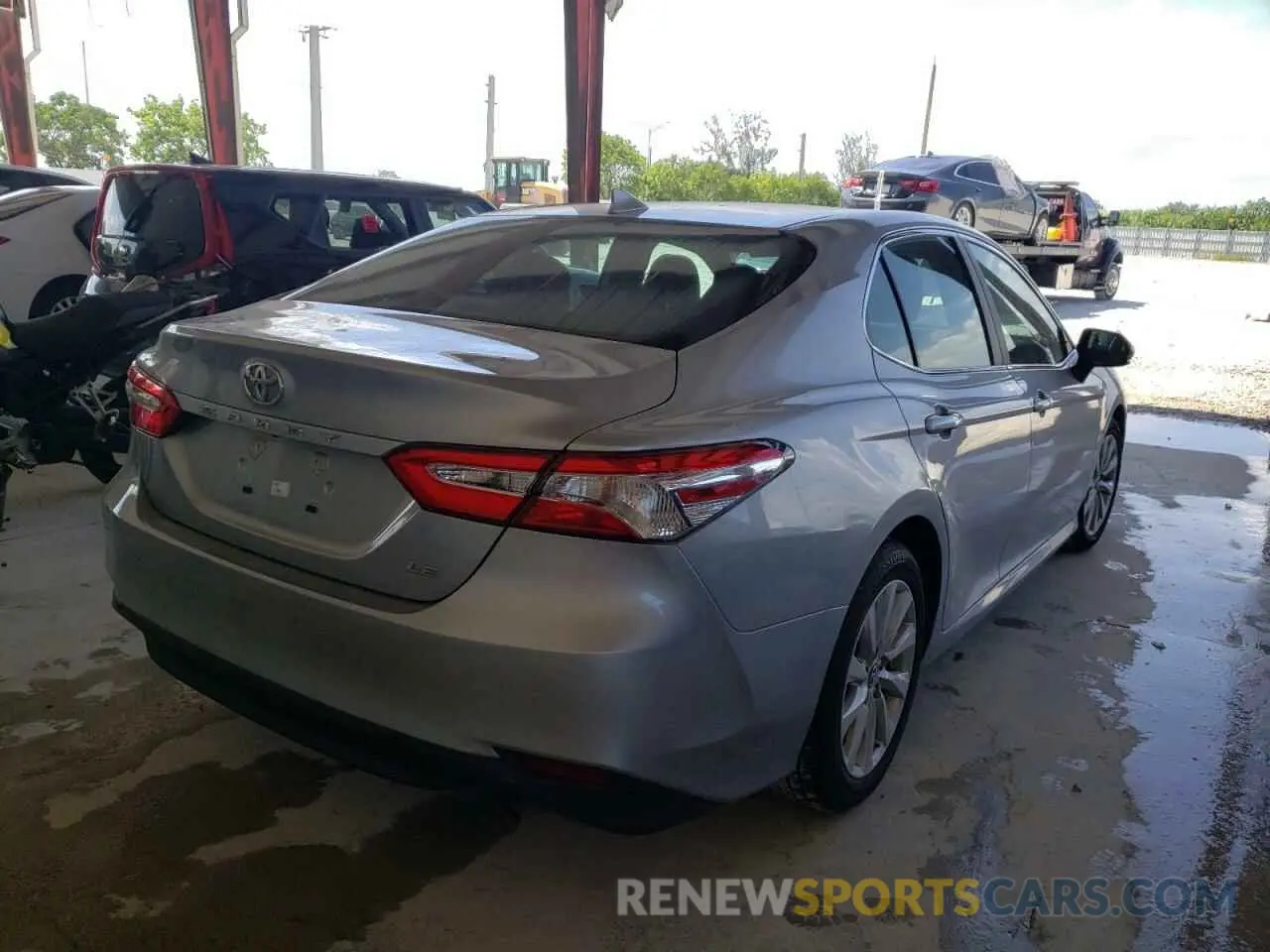 4 Photograph of a damaged car 4T1B11HK1KU811251 TOYOTA CAMRY 2019