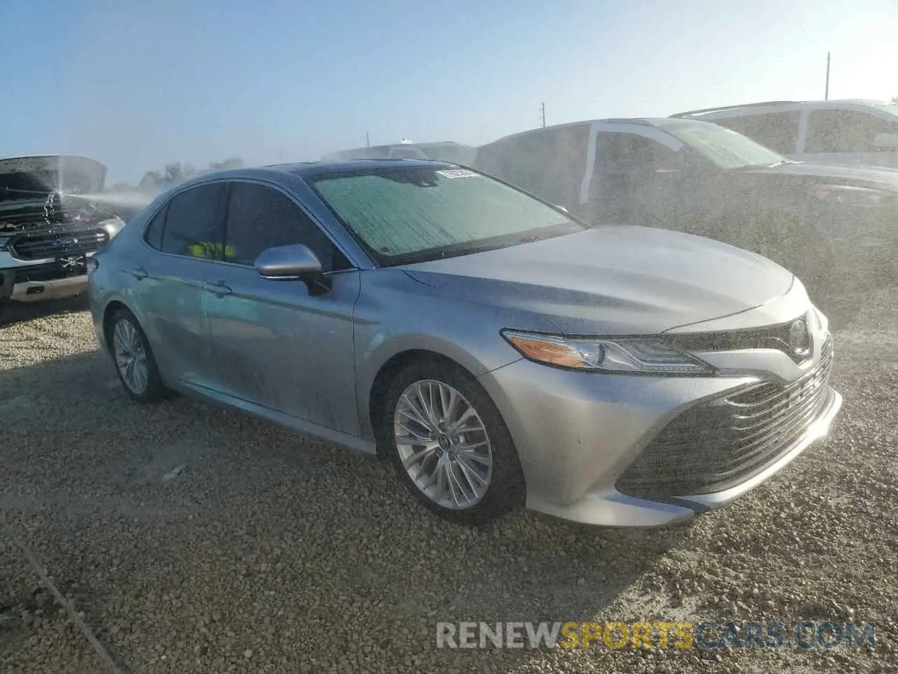 4 Photograph of a damaged car 4T1B11HK1KU838675 TOYOTA CAMRY 2019