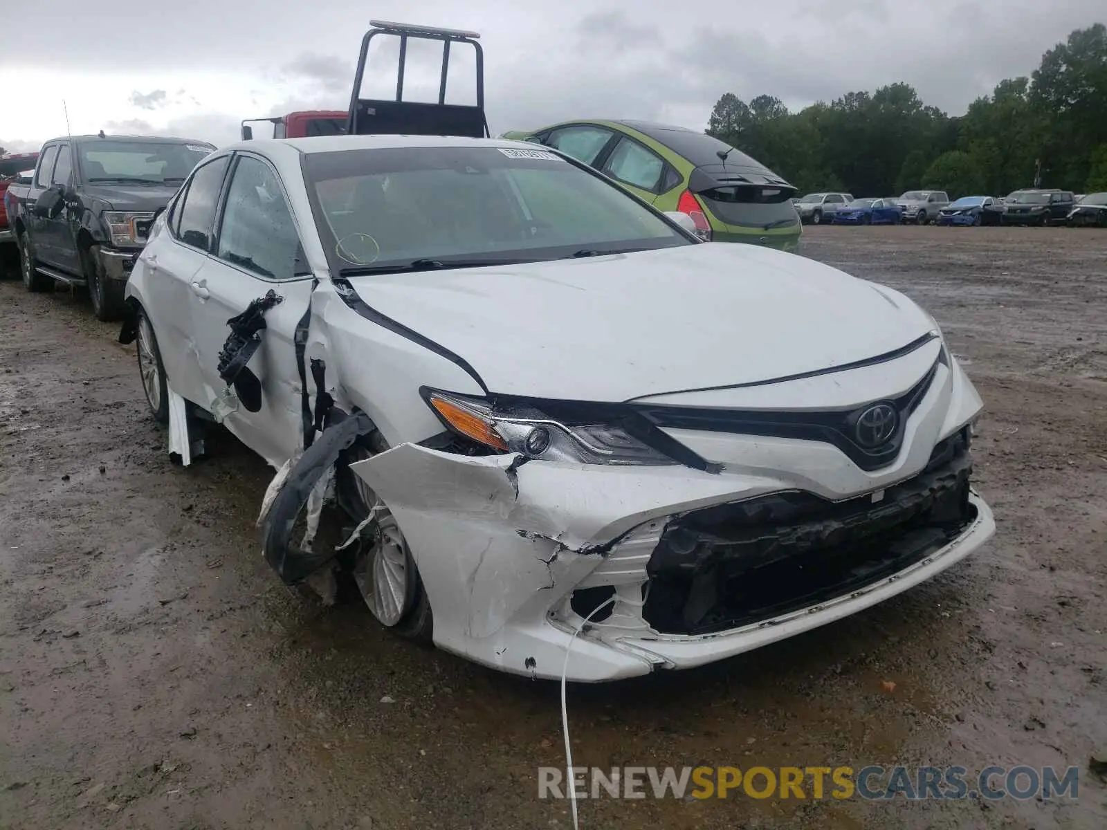 1 Photograph of a damaged car 4T1B11HK1KU840085 TOYOTA CAMRY 2019
