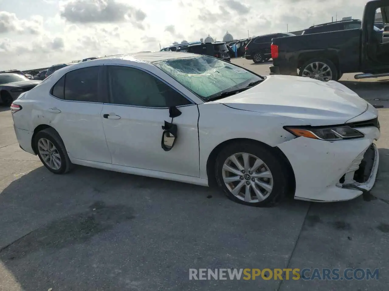 4 Photograph of a damaged car 4T1B11HK1KU841494 TOYOTA CAMRY 2019