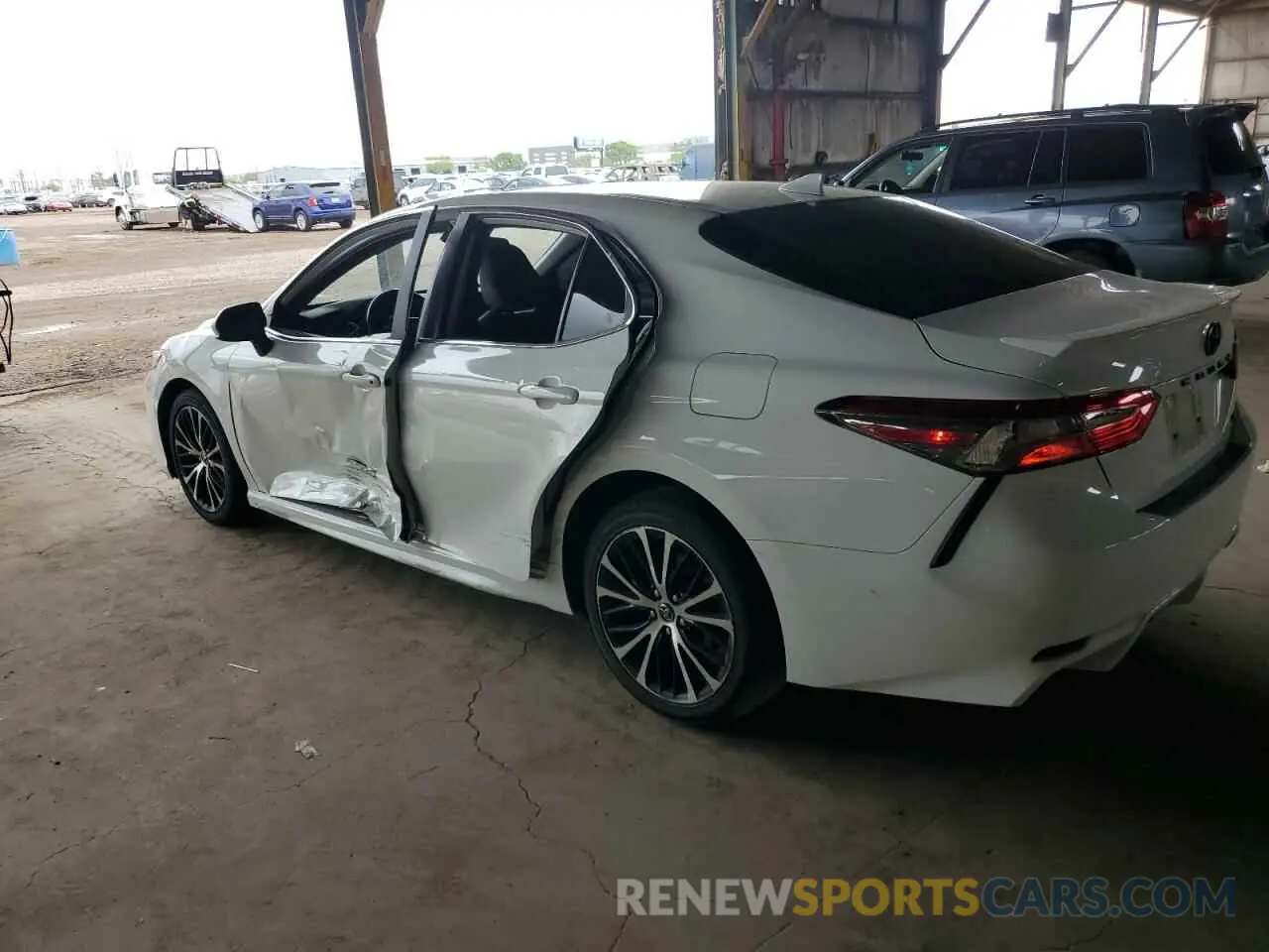 2 Photograph of a damaged car 4T1B11HK1KU854617 TOYOTA CAMRY 2019
