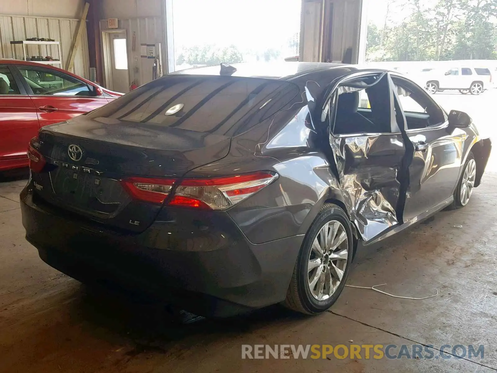 4 Photograph of a damaged car 4T1B11HK2KU174130 TOYOTA CAMRY 2019