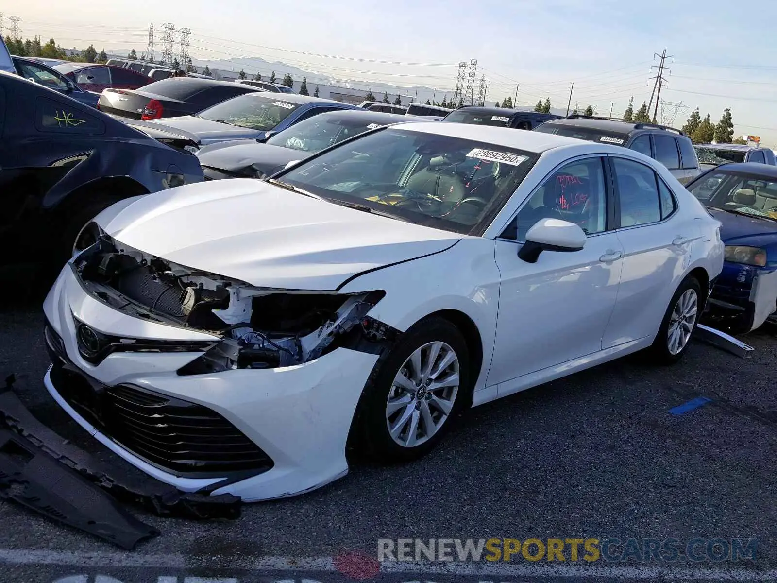 2 Photograph of a damaged car 4T1B11HK2KU216859 TOYOTA CAMRY 2019