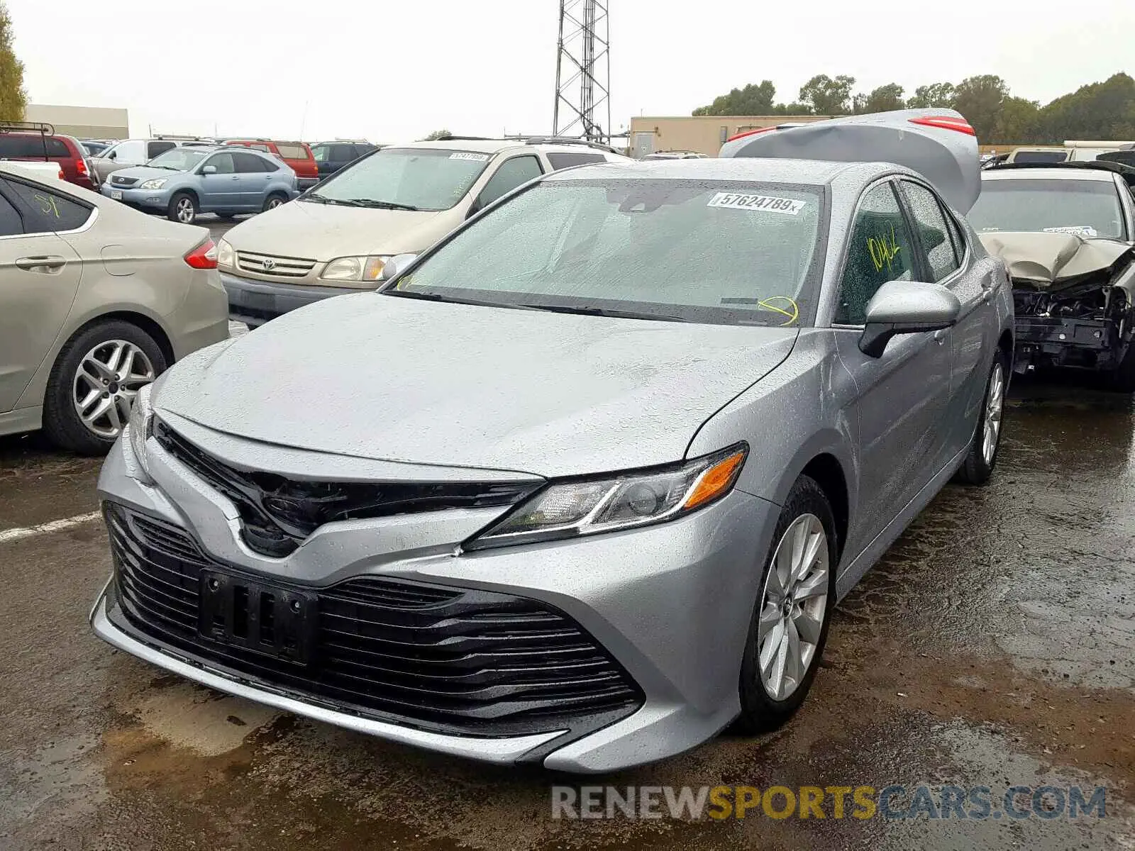 2 Photograph of a damaged car 4T1B11HK2KU242183 TOYOTA CAMRY 2019