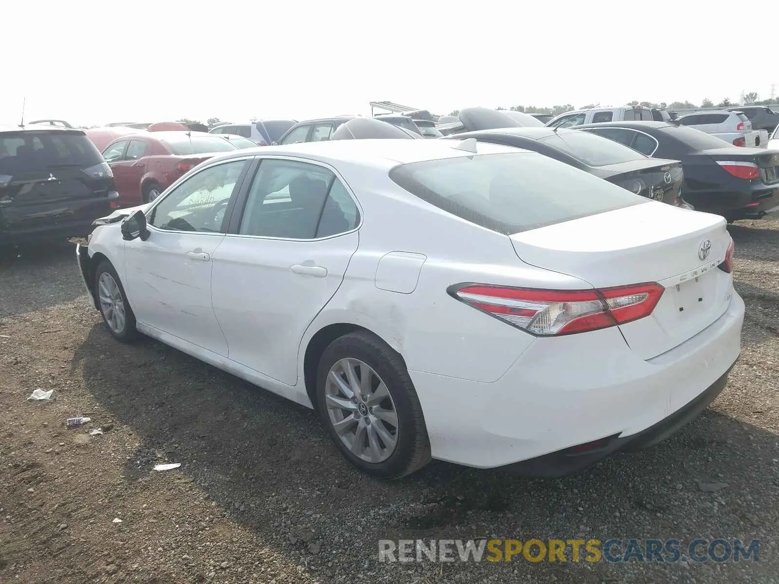 3 Photograph of a damaged car 4T1B11HK2KU243415 TOYOTA CAMRY 2019
