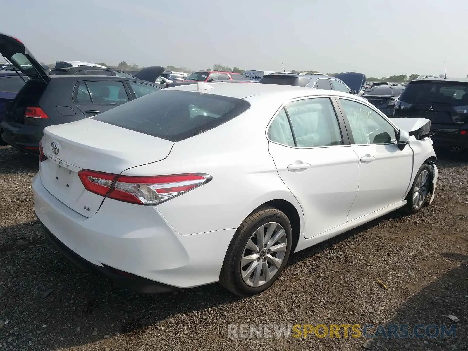 4 Photograph of a damaged car 4T1B11HK2KU243415 TOYOTA CAMRY 2019