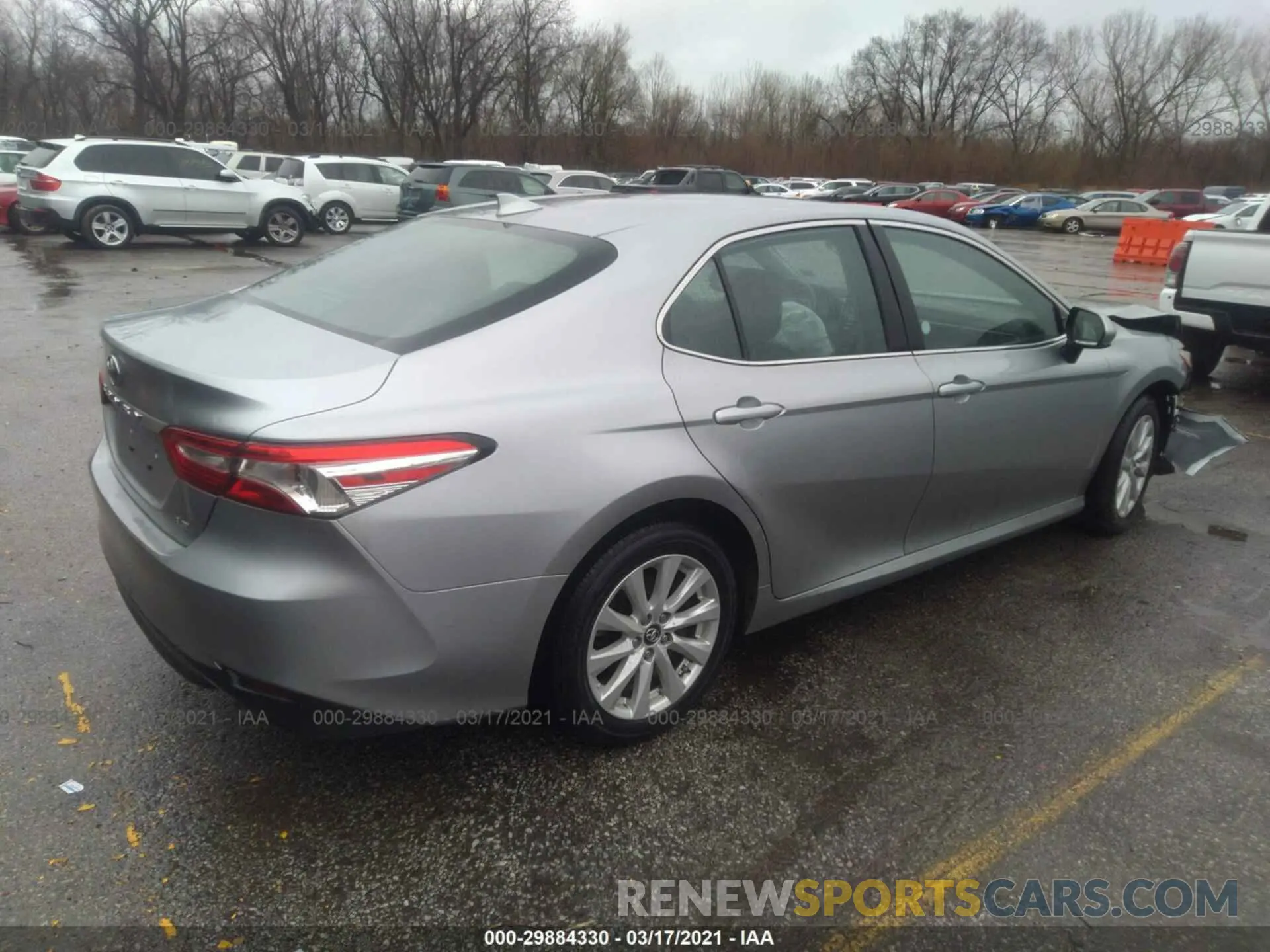 4 Photograph of a damaged car 4T1B11HK2KU257735 TOYOTA CAMRY 2019