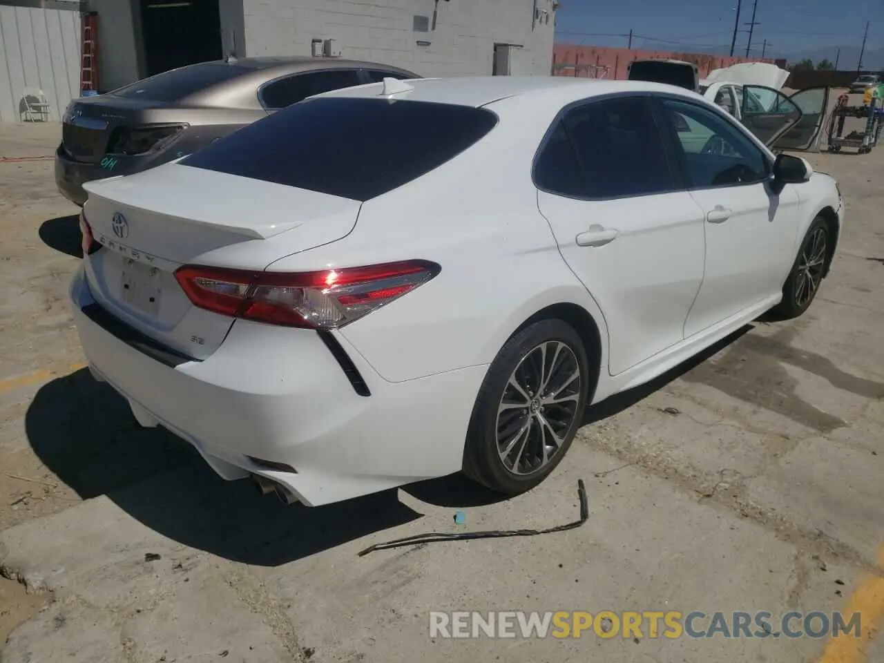 4 Photograph of a damaged car 4T1B11HK2KU272509 TOYOTA CAMRY 2019
