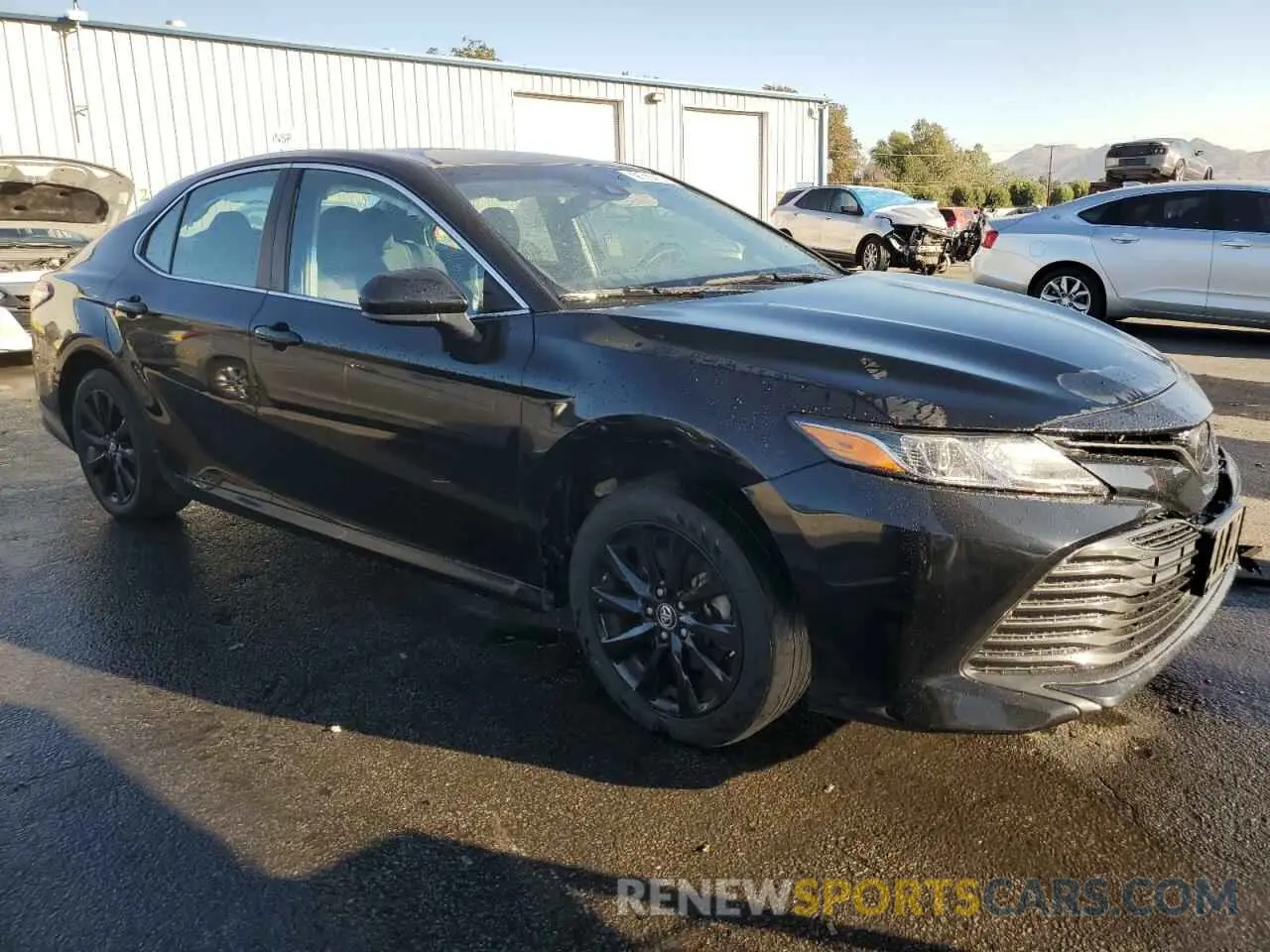 4 Photograph of a damaged car 4T1B11HK2KU280660 TOYOTA CAMRY 2019