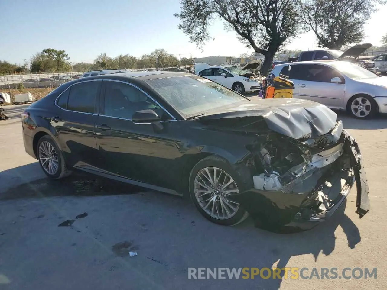 4 Photograph of a damaged car 4T1B11HK2KU695042 TOYOTA CAMRY 2019