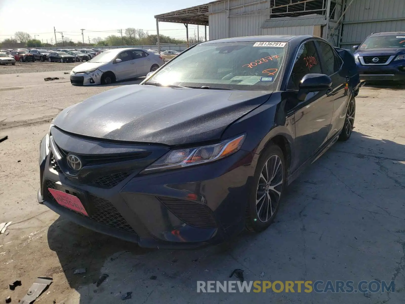 2 Photograph of a damaged car 4T1B11HK2KU702877 TOYOTA CAMRY 2019