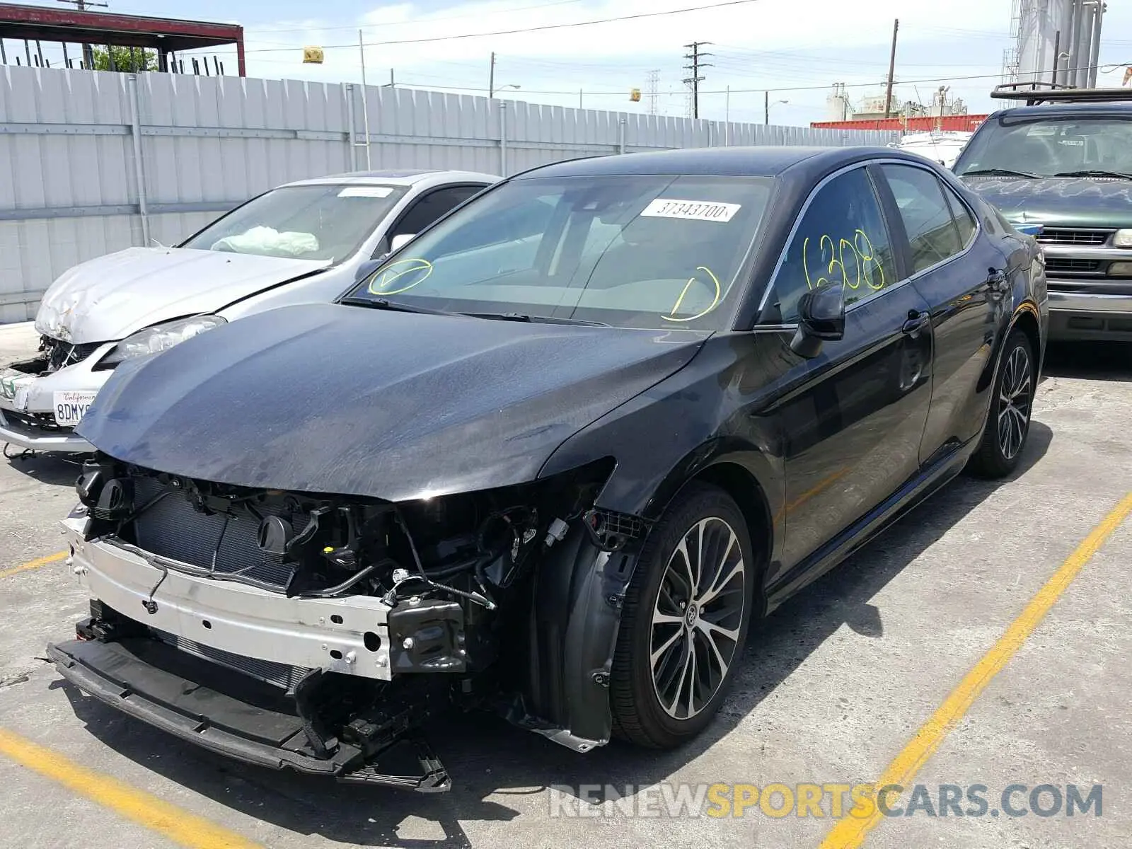 2 Photograph of a damaged car 4T1B11HK2KU791592 TOYOTA CAMRY 2019