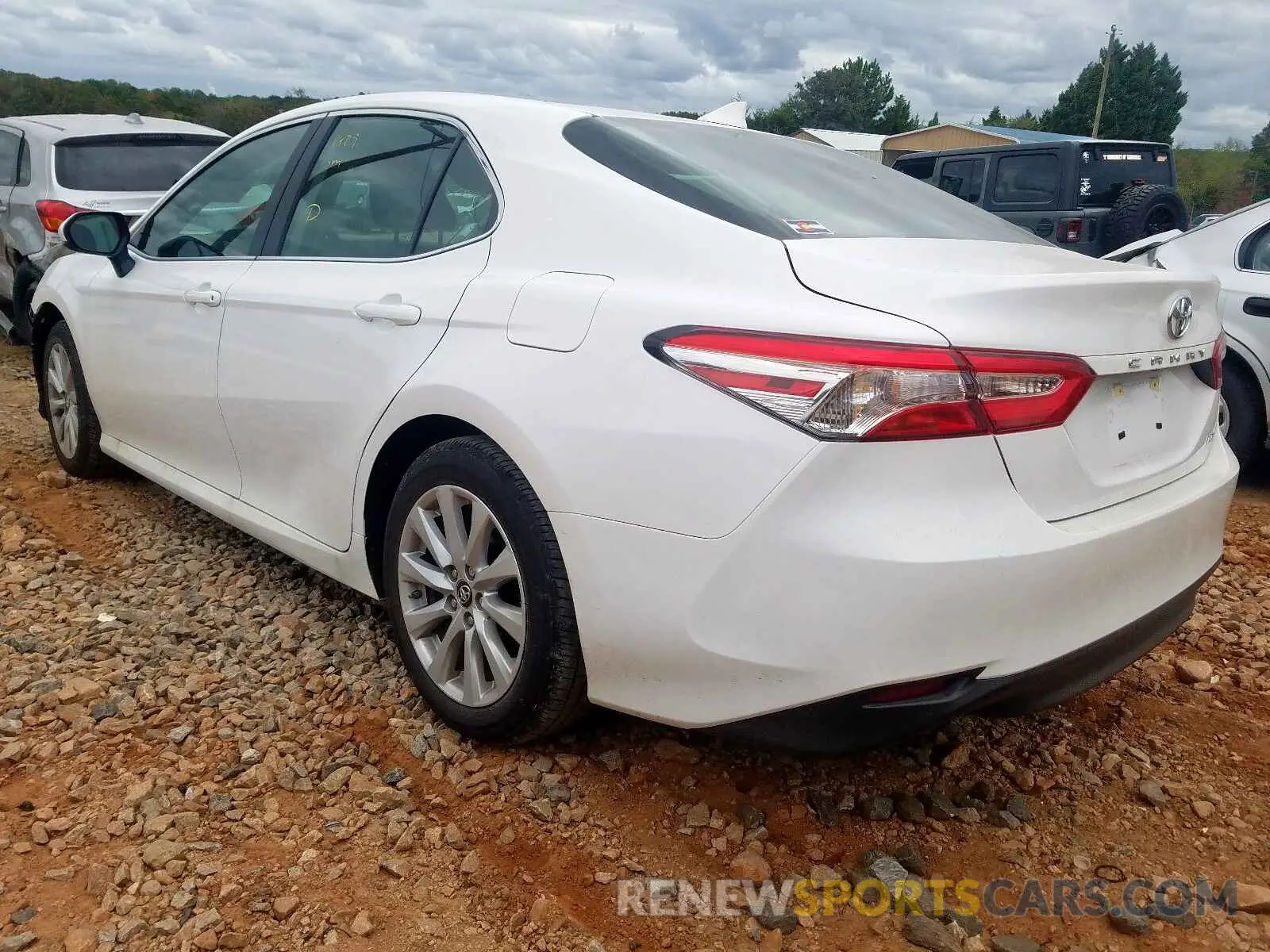 3 Photograph of a damaged car 4T1B11HK2KU819732 TOYOTA CAMRY 2019