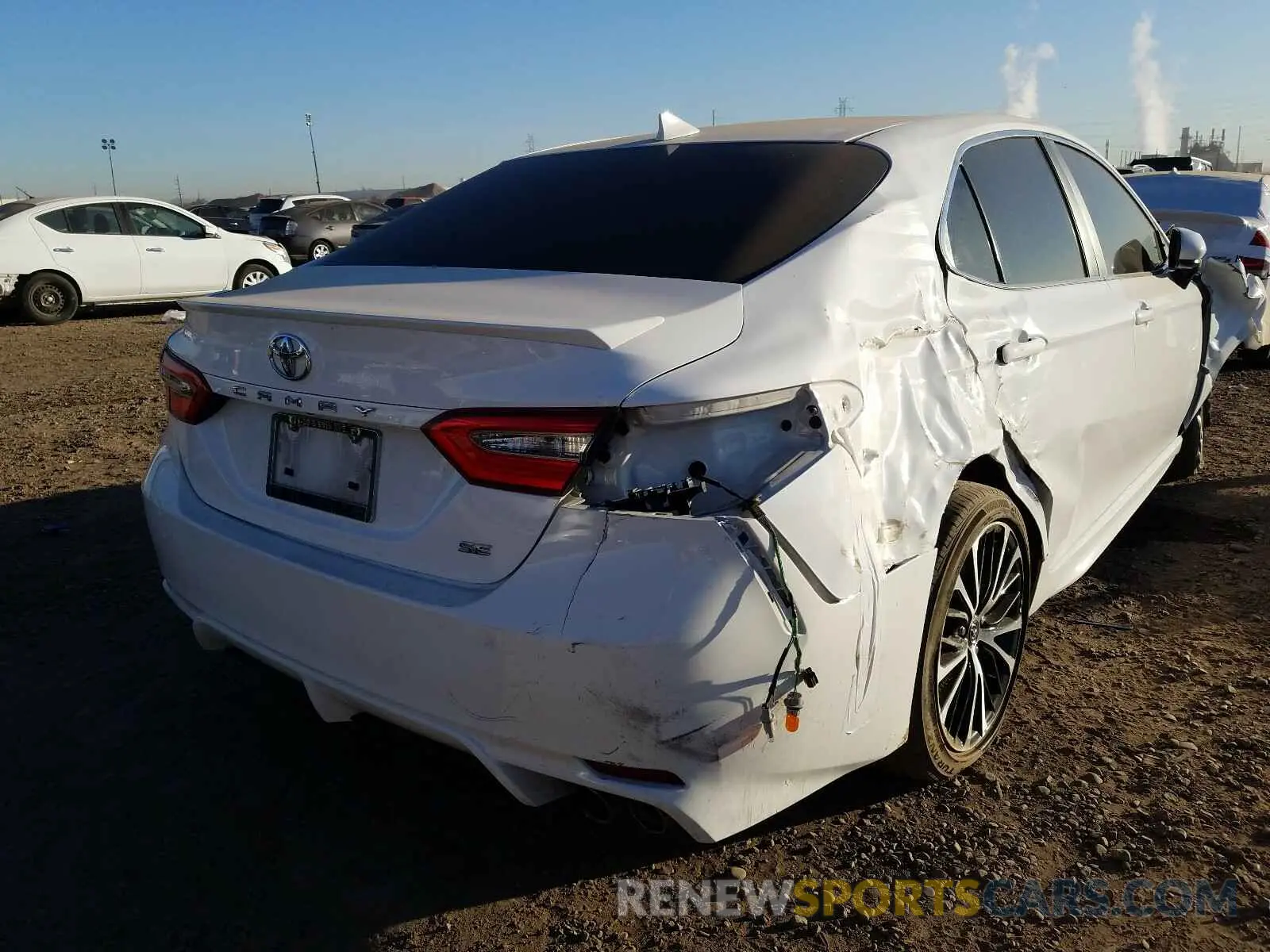 4 Photograph of a damaged car 4T1B11HK3KU209113 TOYOTA CAMRY 2019