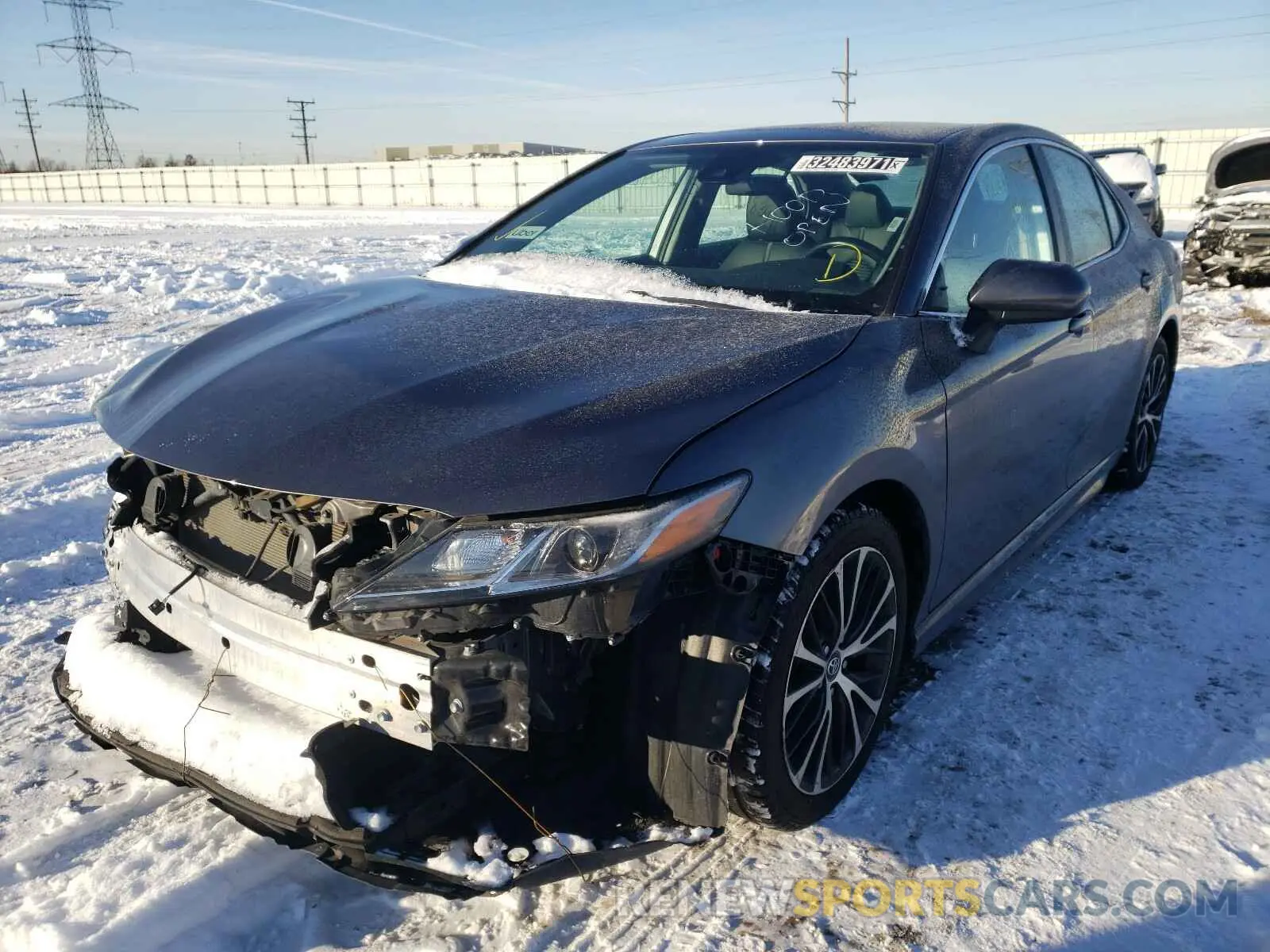 2 Photograph of a damaged car 4T1B11HK3KU227319 TOYOTA CAMRY 2019