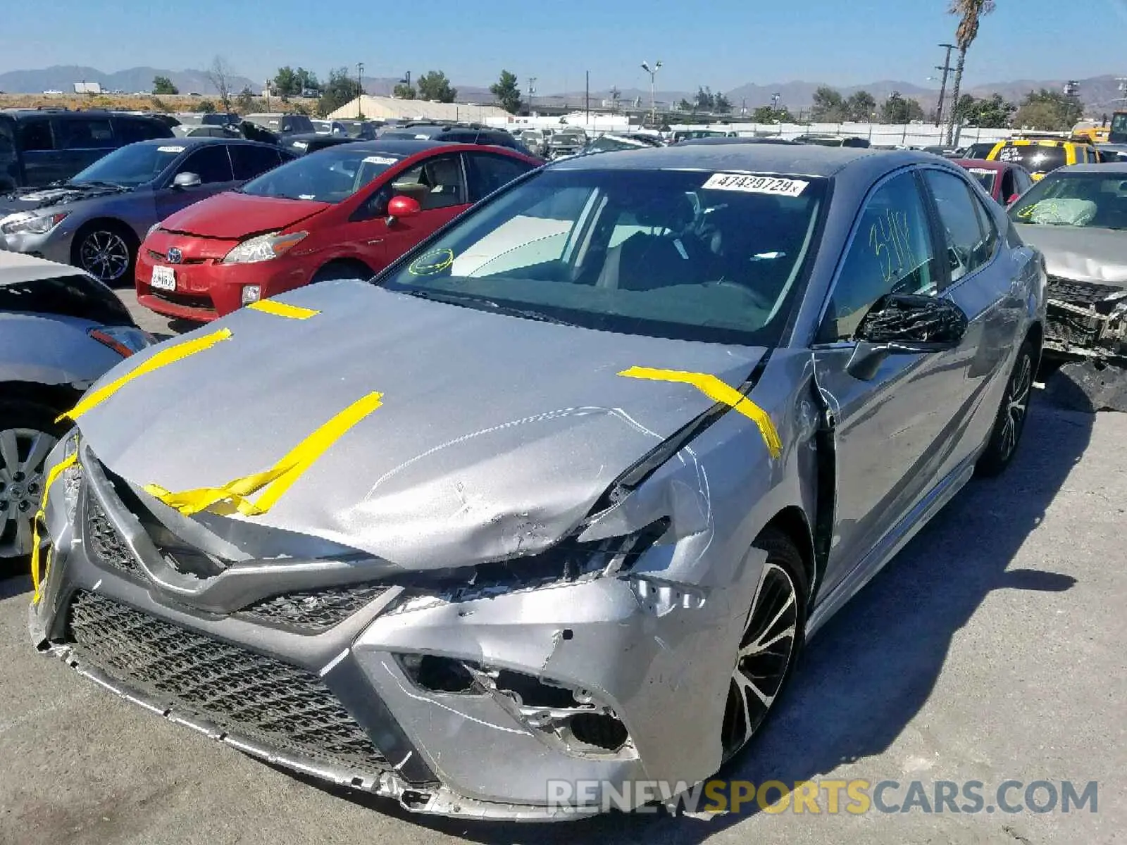 2 Photograph of a damaged car 4T1B11HK3KU242810 TOYOTA CAMRY 2019