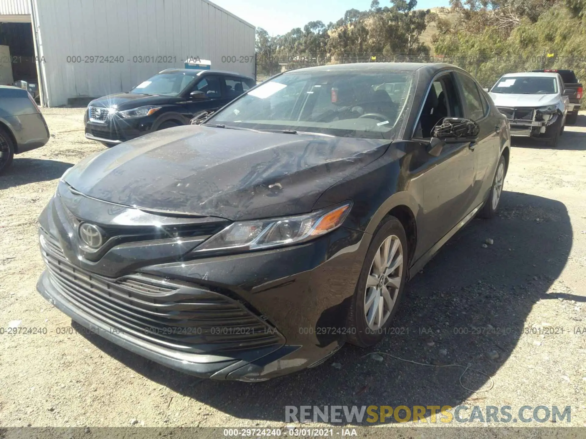 2 Photograph of a damaged car 4T1B11HK3KU256979 TOYOTA CAMRY 2019