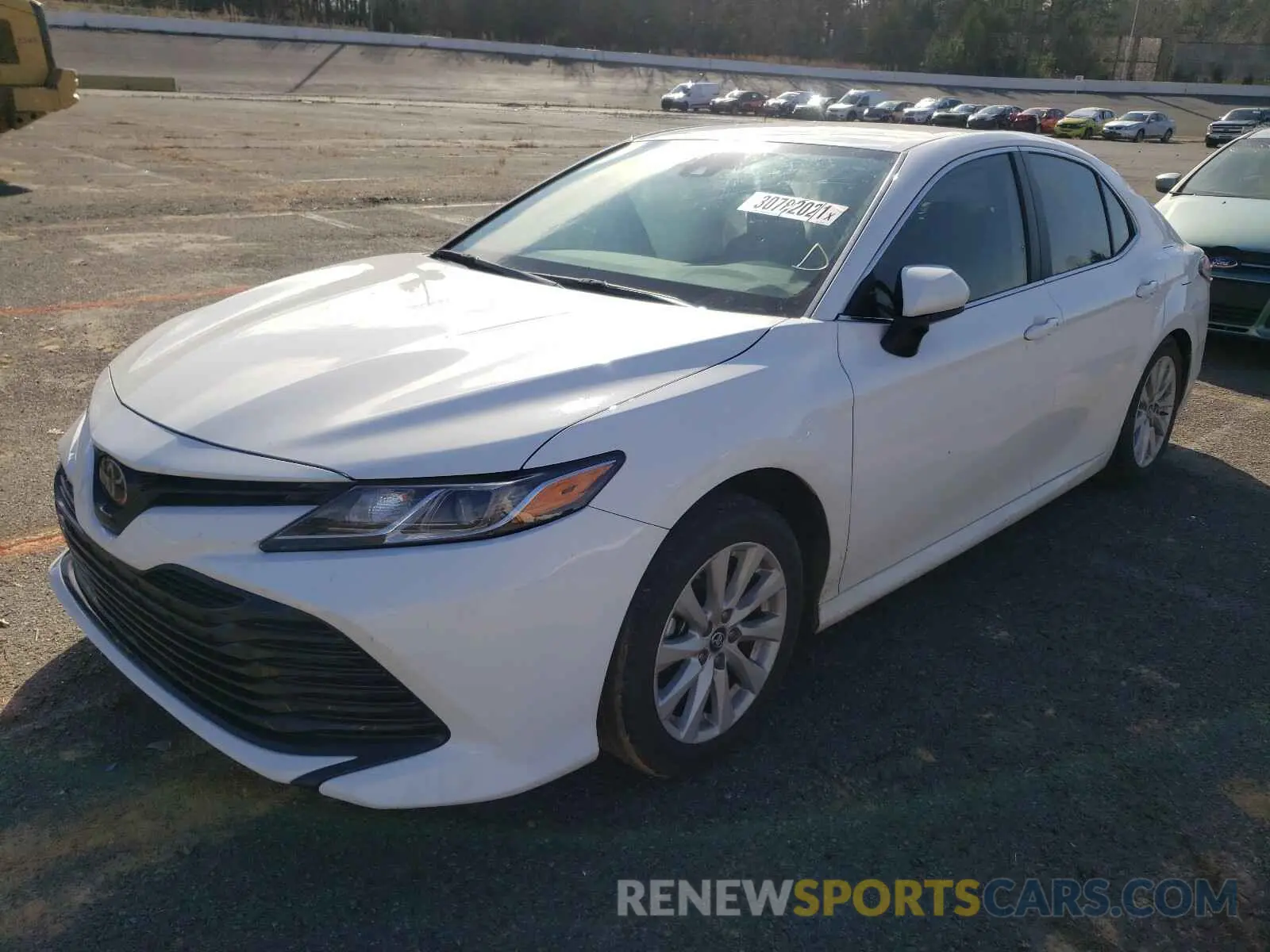 2 Photograph of a damaged car 4T1B11HK3KU696085 TOYOTA CAMRY 2019