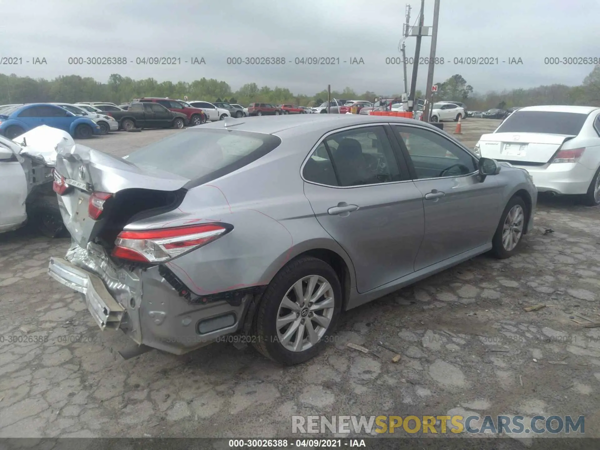 4 Photograph of a damaged car 4T1B11HK3KU696409 TOYOTA CAMRY 2019