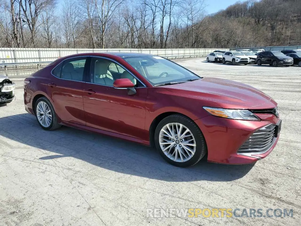 4 Photograph of a damaged car 4T1B11HK3KU704167 TOYOTA CAMRY 2019