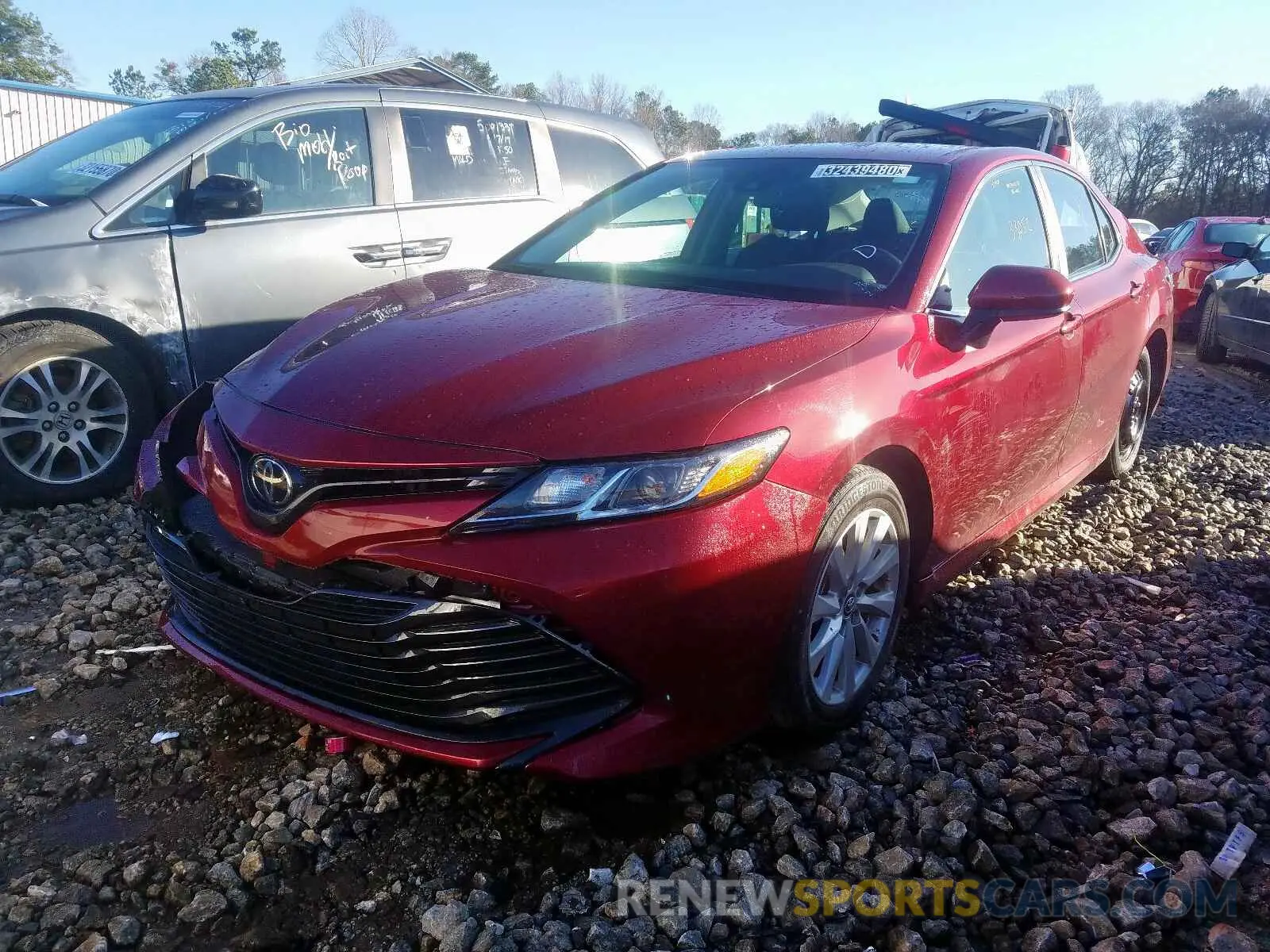 2 Photograph of a damaged car 4T1B11HK3KU705450 TOYOTA CAMRY 2019