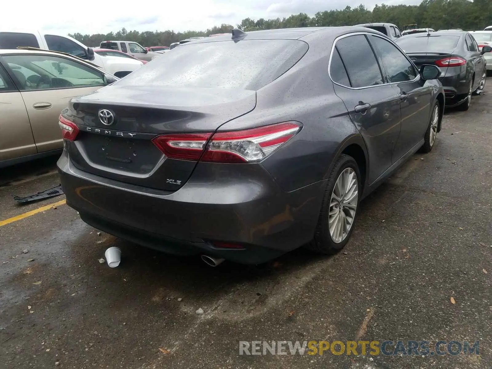 4 Photograph of a damaged car 4T1B11HK3KU714245 TOYOTA CAMRY 2019