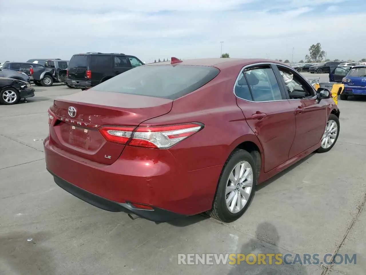 4 Photograph of a damaged car 4T1B11HK3KU744975 TOYOTA CAMRY 2019