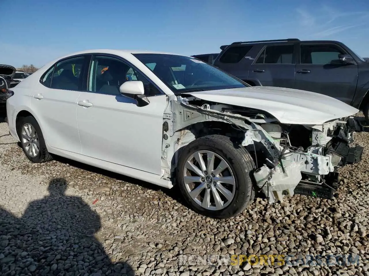 4 Photograph of a damaged car 4T1B11HK3KU759069 TOYOTA CAMRY 2019