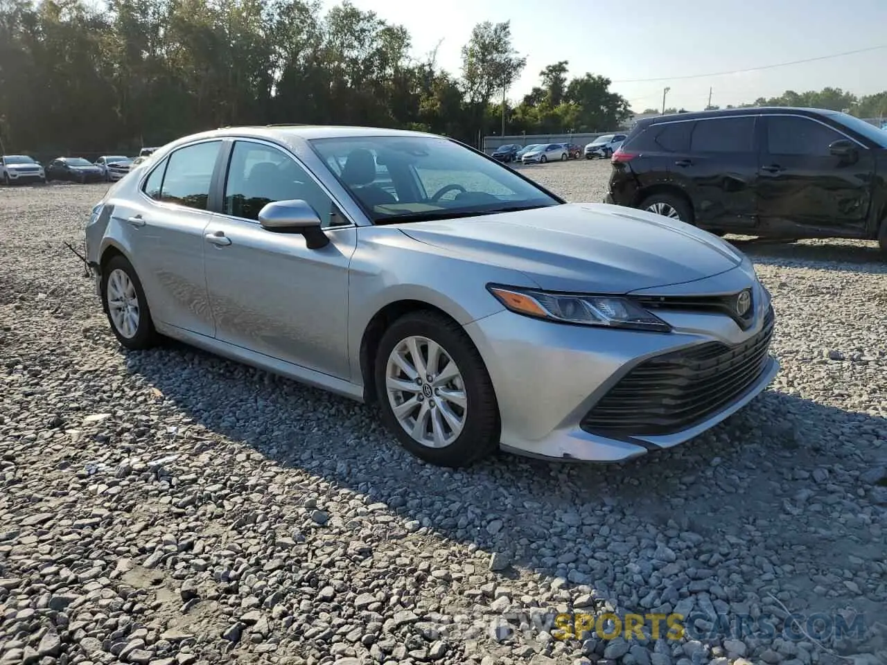 1 Photograph of a damaged car 4T1B11HK3KU826107 TOYOTA CAMRY 2019
