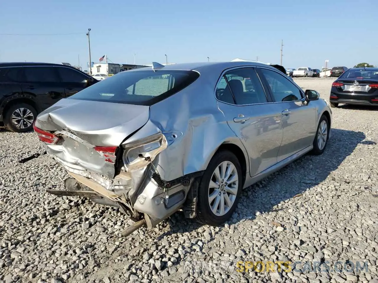 4 Photograph of a damaged car 4T1B11HK3KU826107 TOYOTA CAMRY 2019
