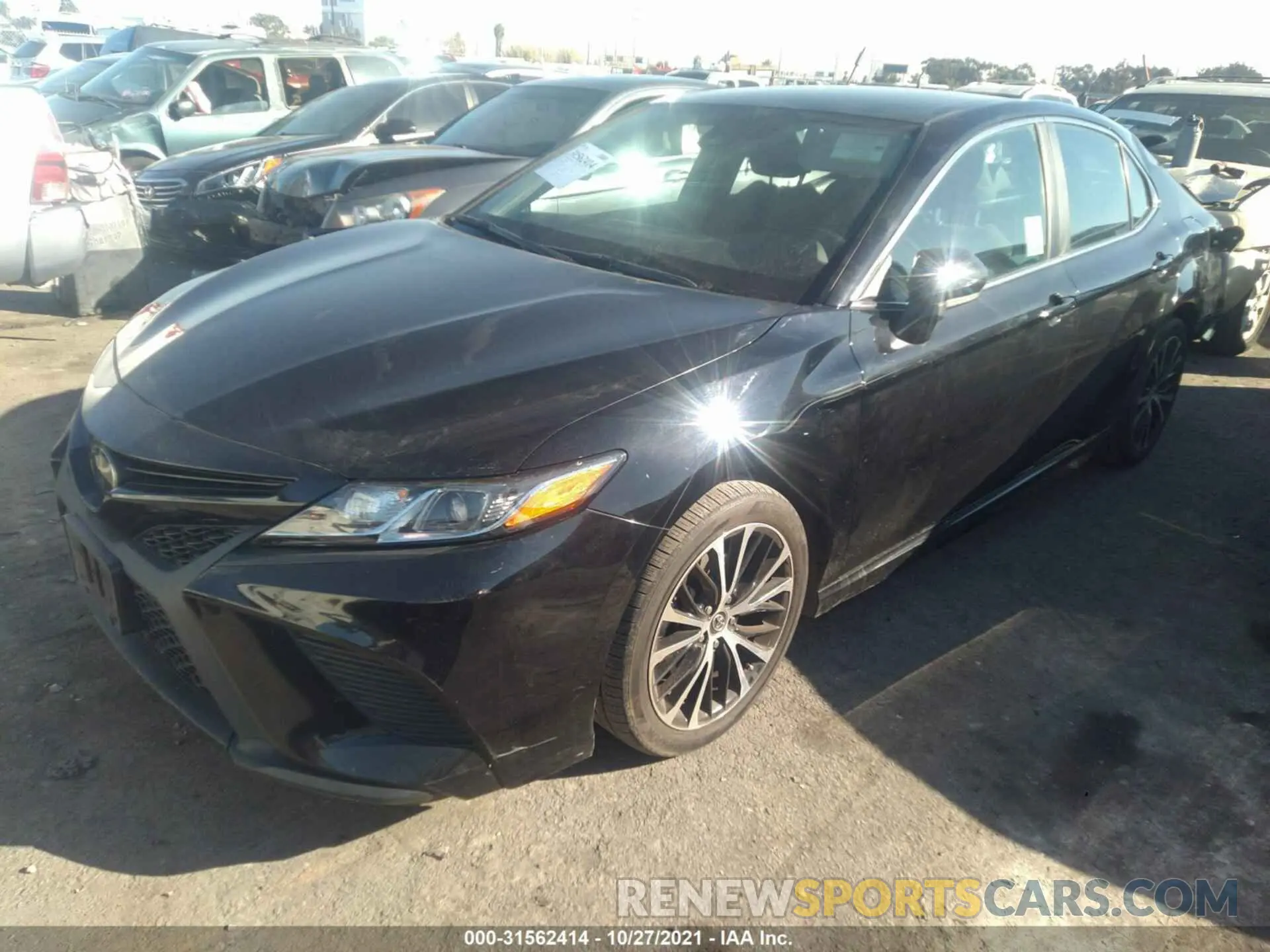 2 Photograph of a damaged car 4T1B11HK3KU852299 TOYOTA CAMRY 2019