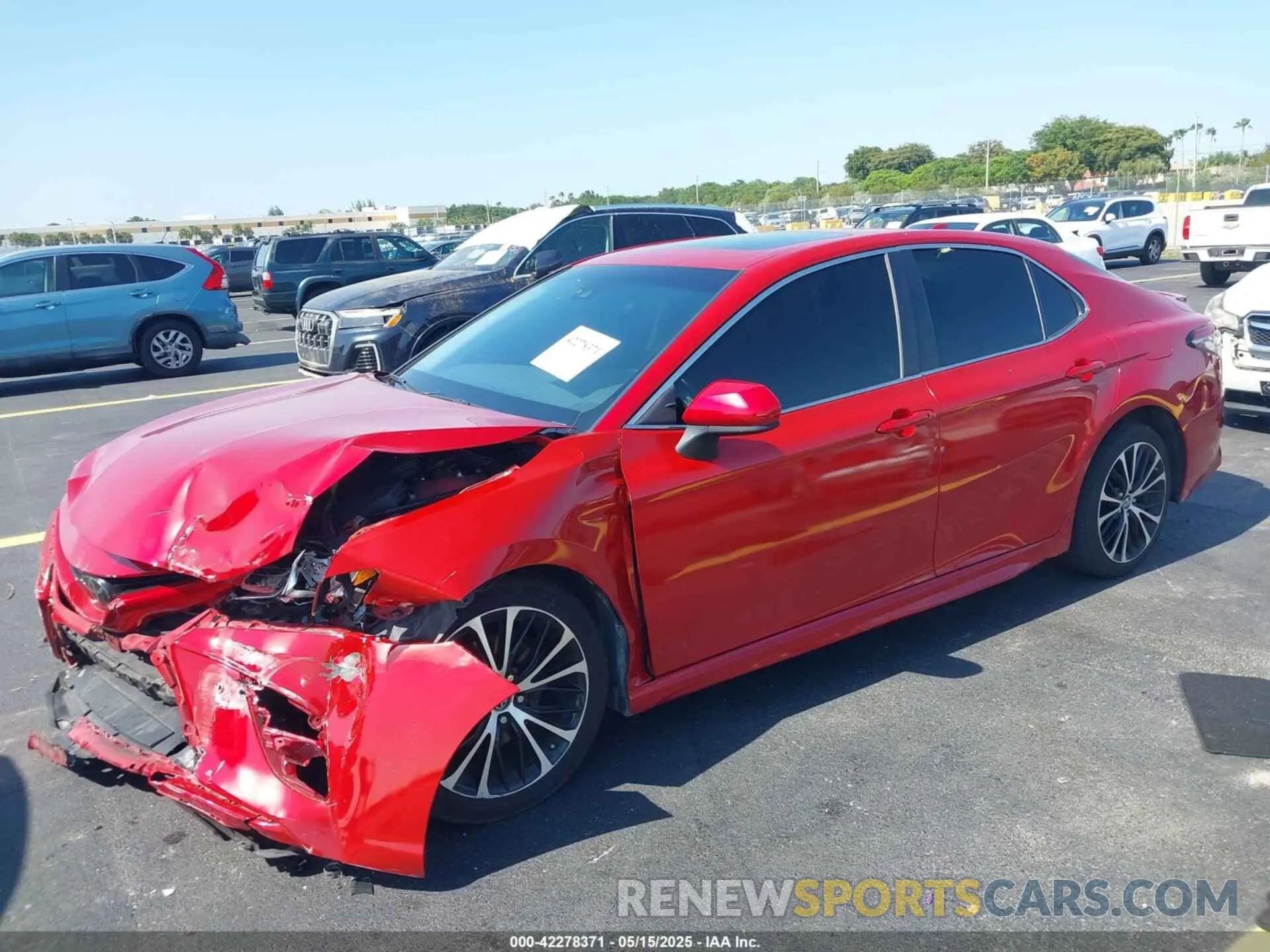 2 Photograph of a damaged car 4T1B11HK4KU168863 TOYOTA CAMRY 2019