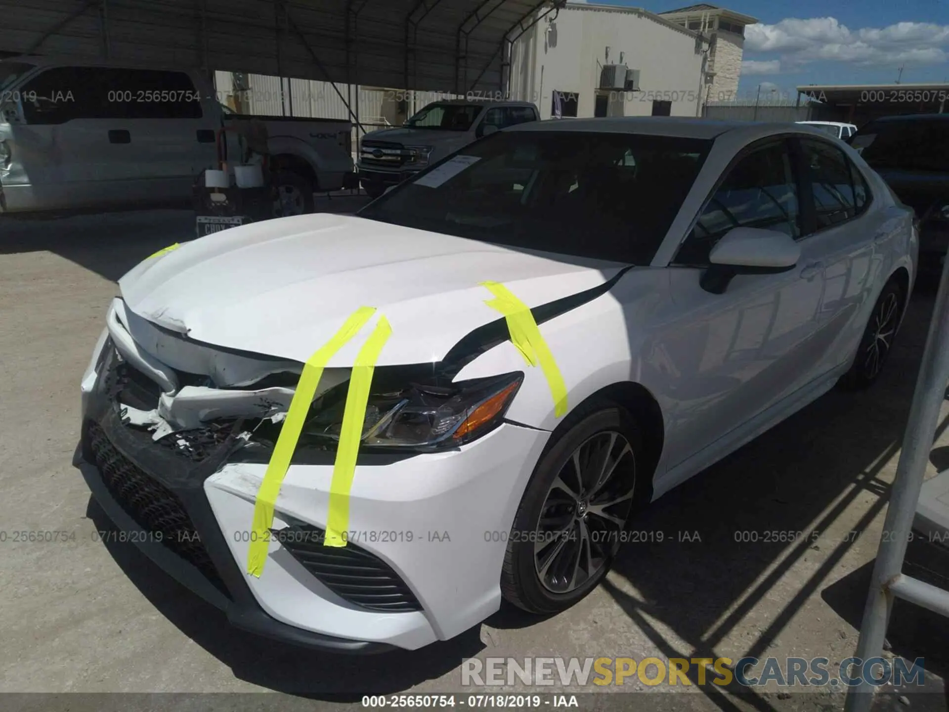2 Photograph of a damaged car 4T1B11HK4KU171942 TOYOTA CAMRY 2019