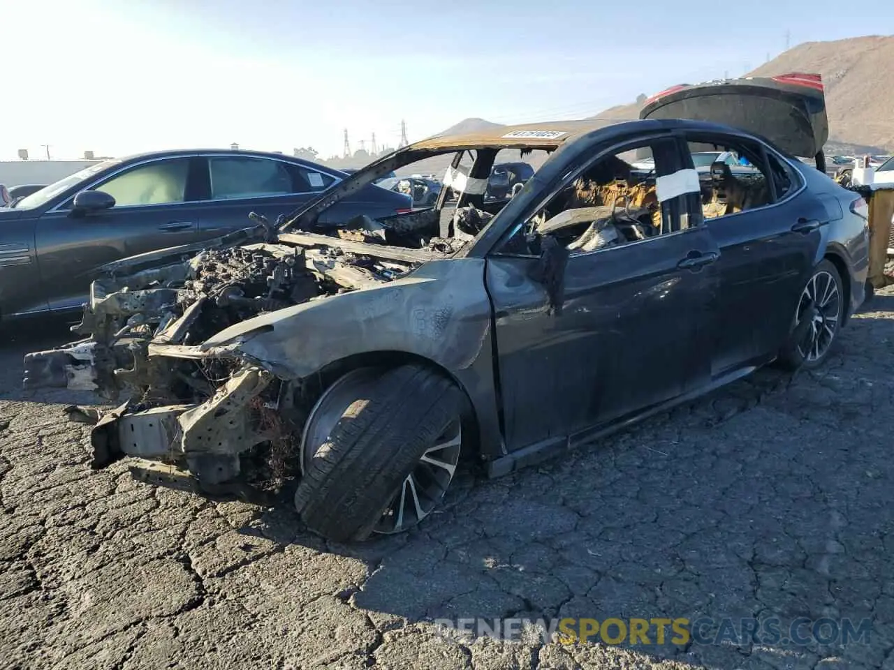 1 Photograph of a damaged car 4T1B11HK4KU174307 TOYOTA CAMRY 2019